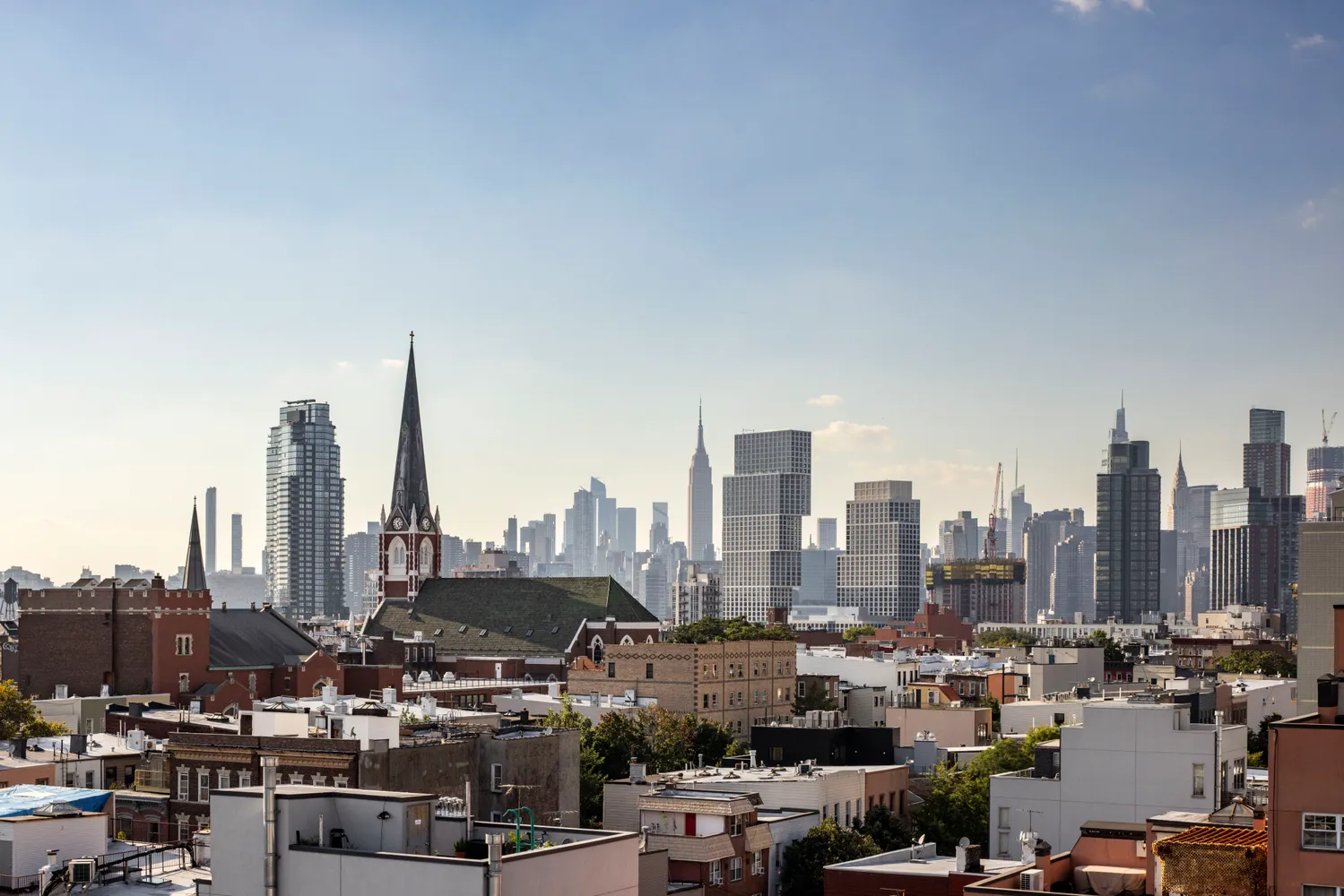 a view of city and a tall buildings