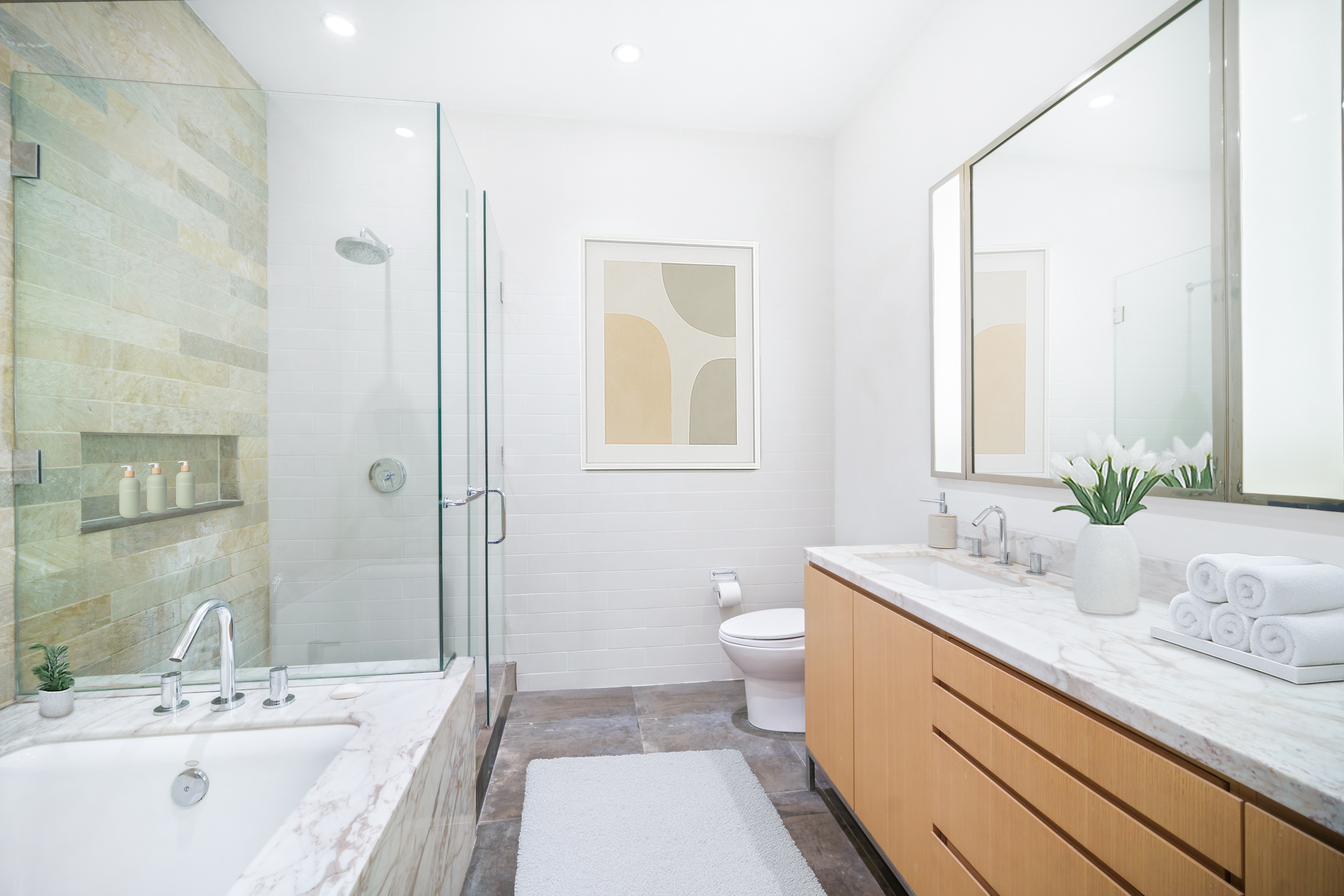 263 9th Avenue, Unit 7A Manhattan, NY 10001 - Photo 5 of 11 a bathroom with a granite countertop sink toilet a large mirror a shower and a bathtub