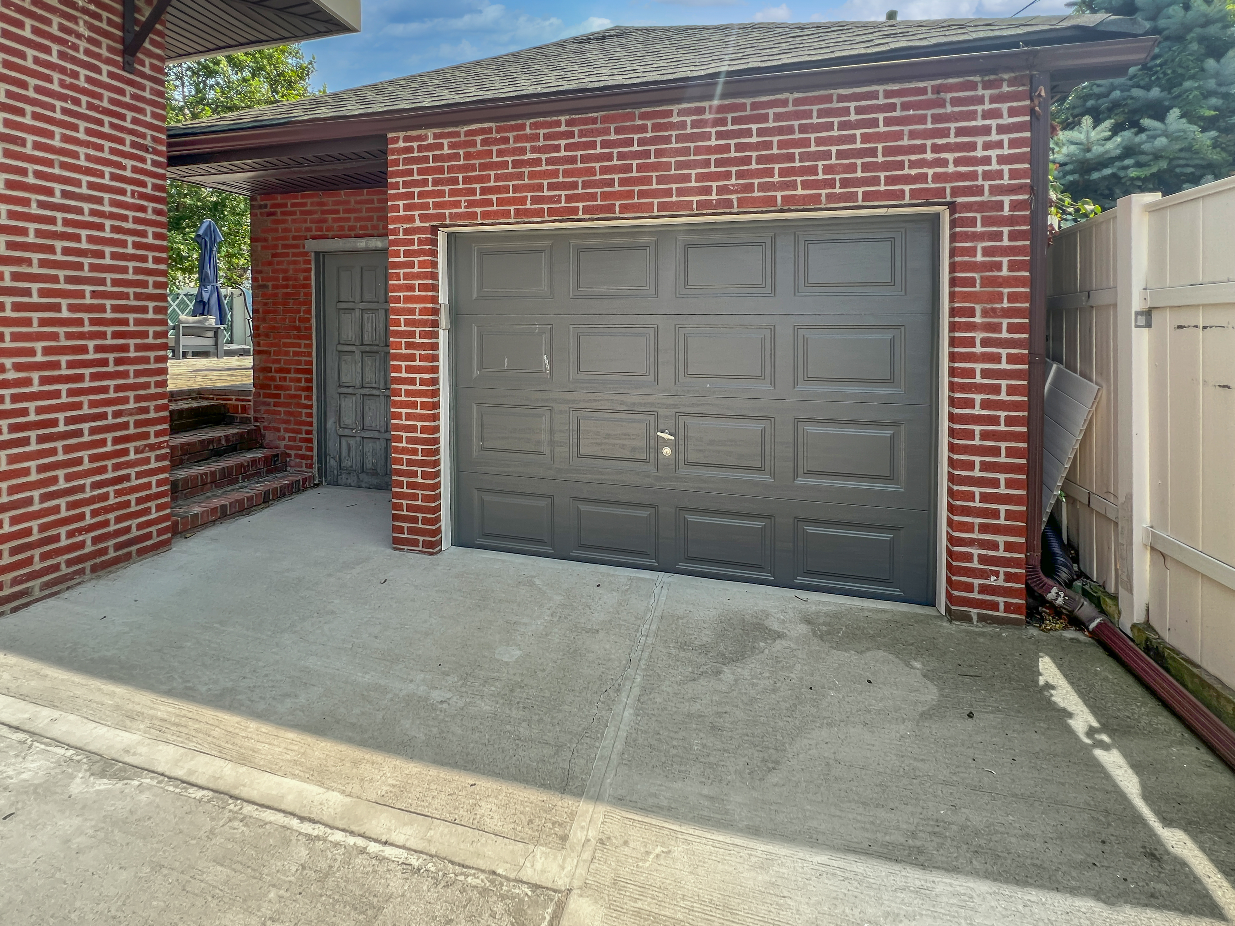 5021 Surf Avenue Brooklyn, NY 11224 - Photo 24 of 32 a front view of a house with a yard