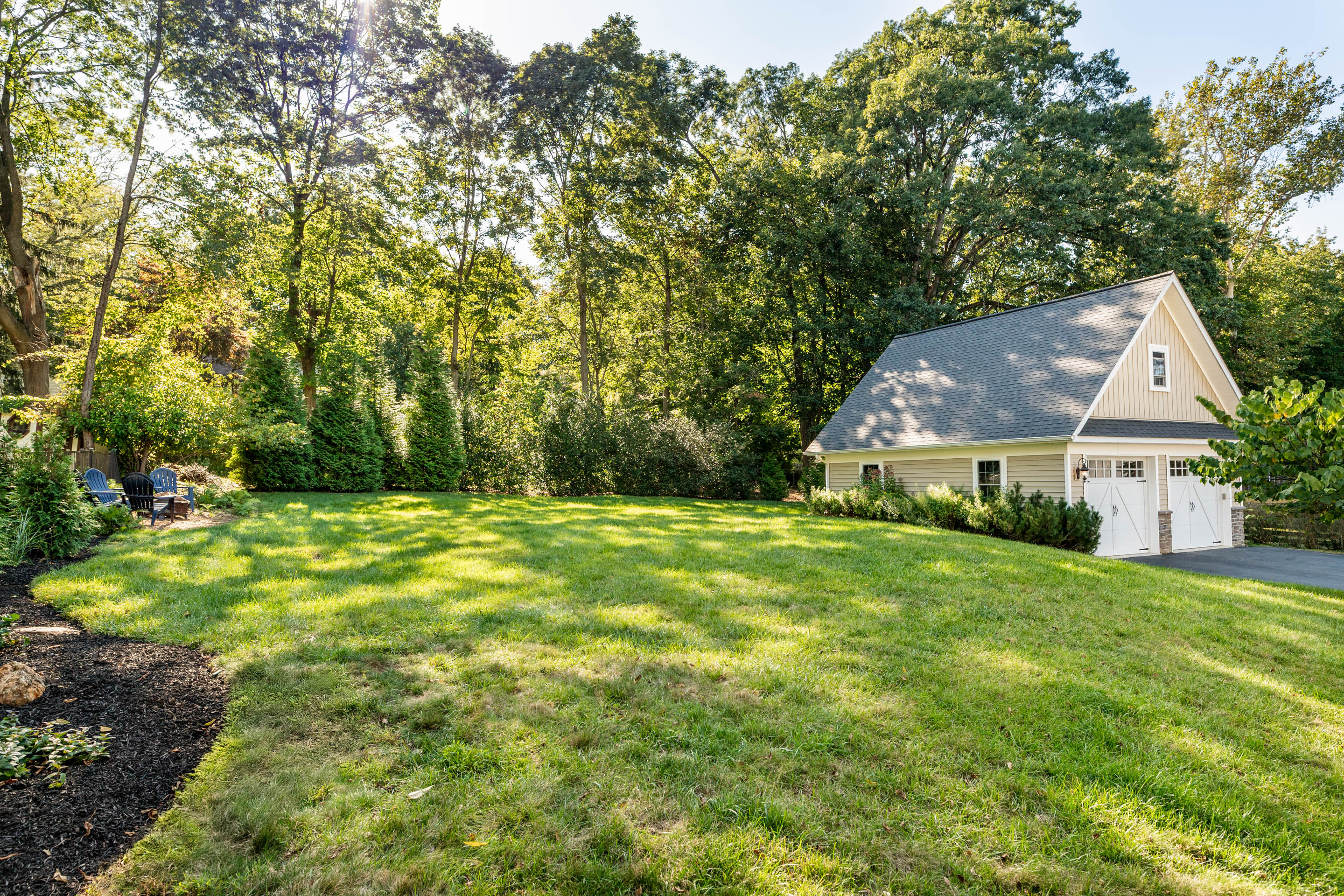 1136 Seaton Ross Road Wayne, PA 19087 - Photo 43 of 48 a view of a big yard next to a house