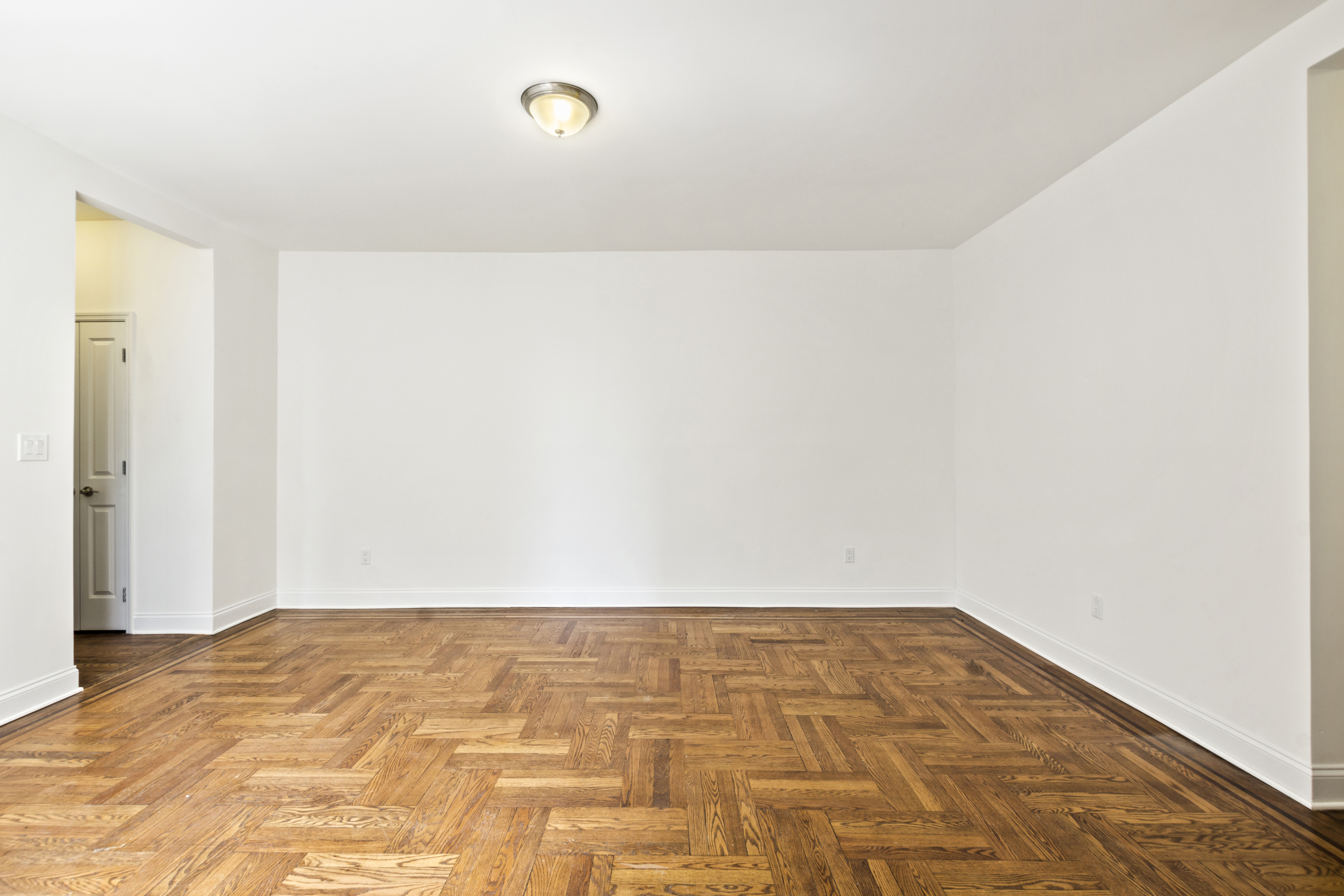 61-09 39th Avenue, Unit 2H Queens, NY 11377 - Photo 5 of 9 a view of empty room