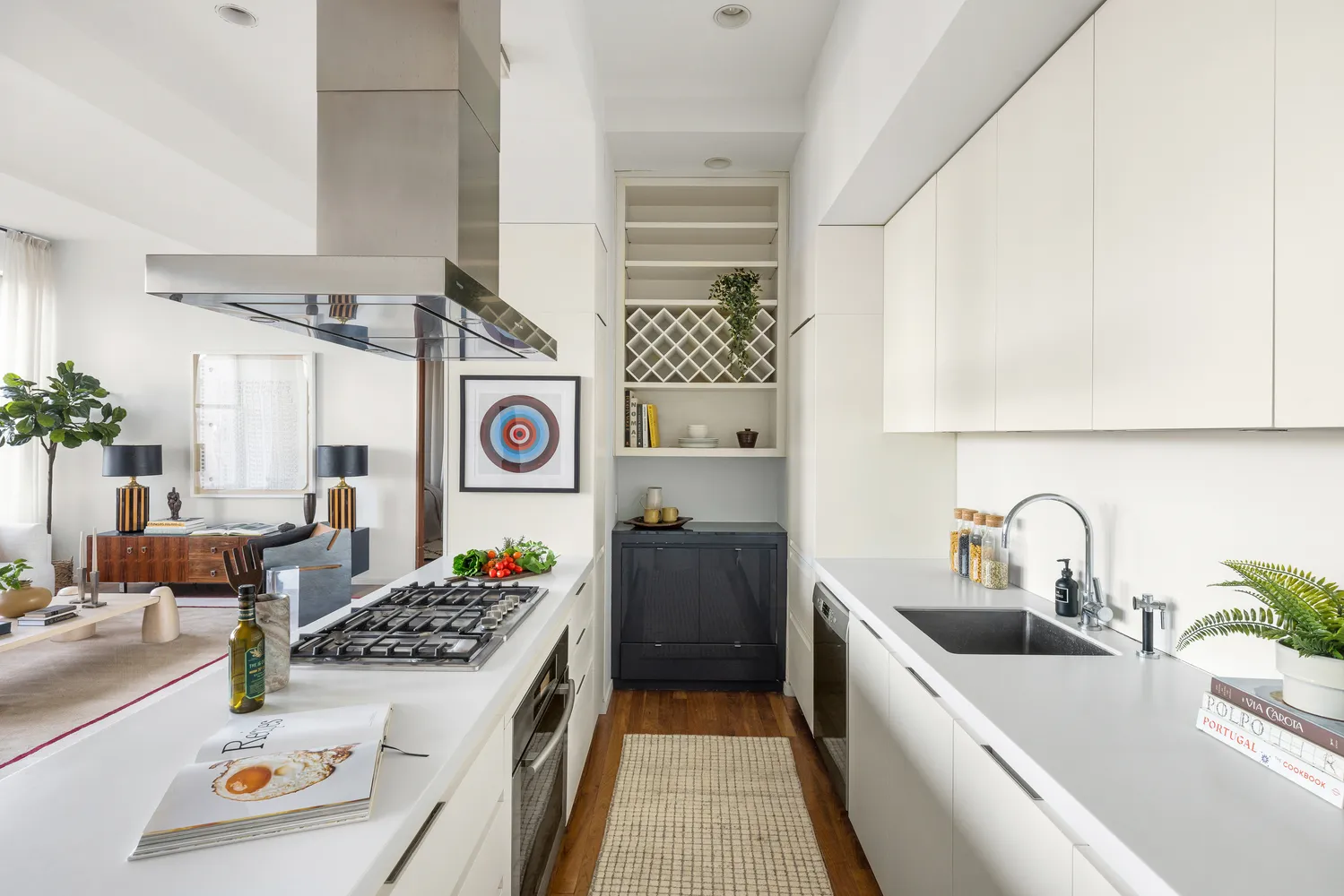 a kitchen with a sink stove and refrigerator
