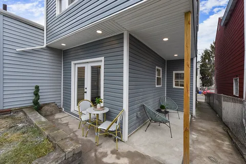 a picture of a bench in front of a door