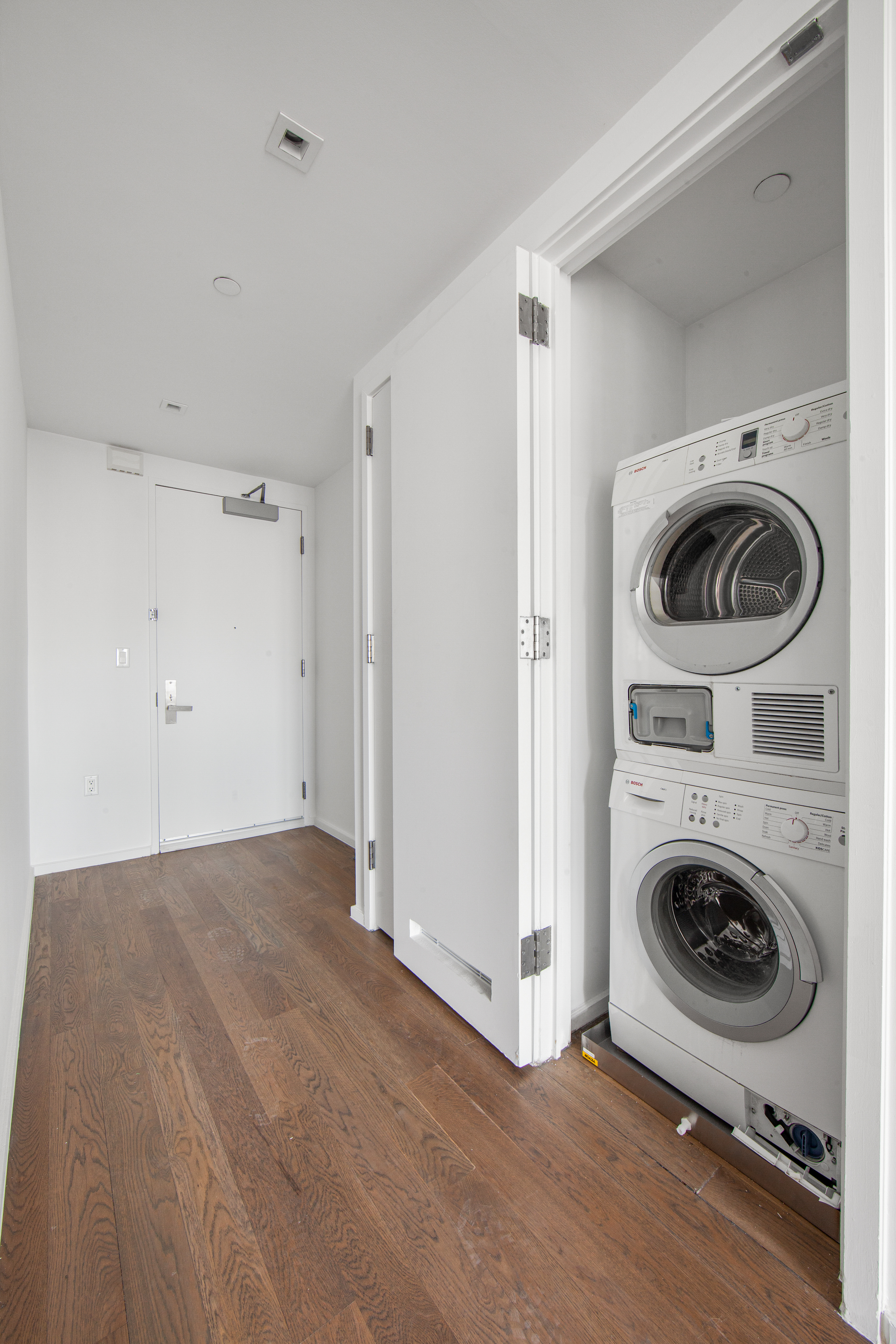 202 8th Street, Unit 8B Brooklyn, NY 11215 - Photo 9 of 20 a view of a storage & utility room with a washer dryer