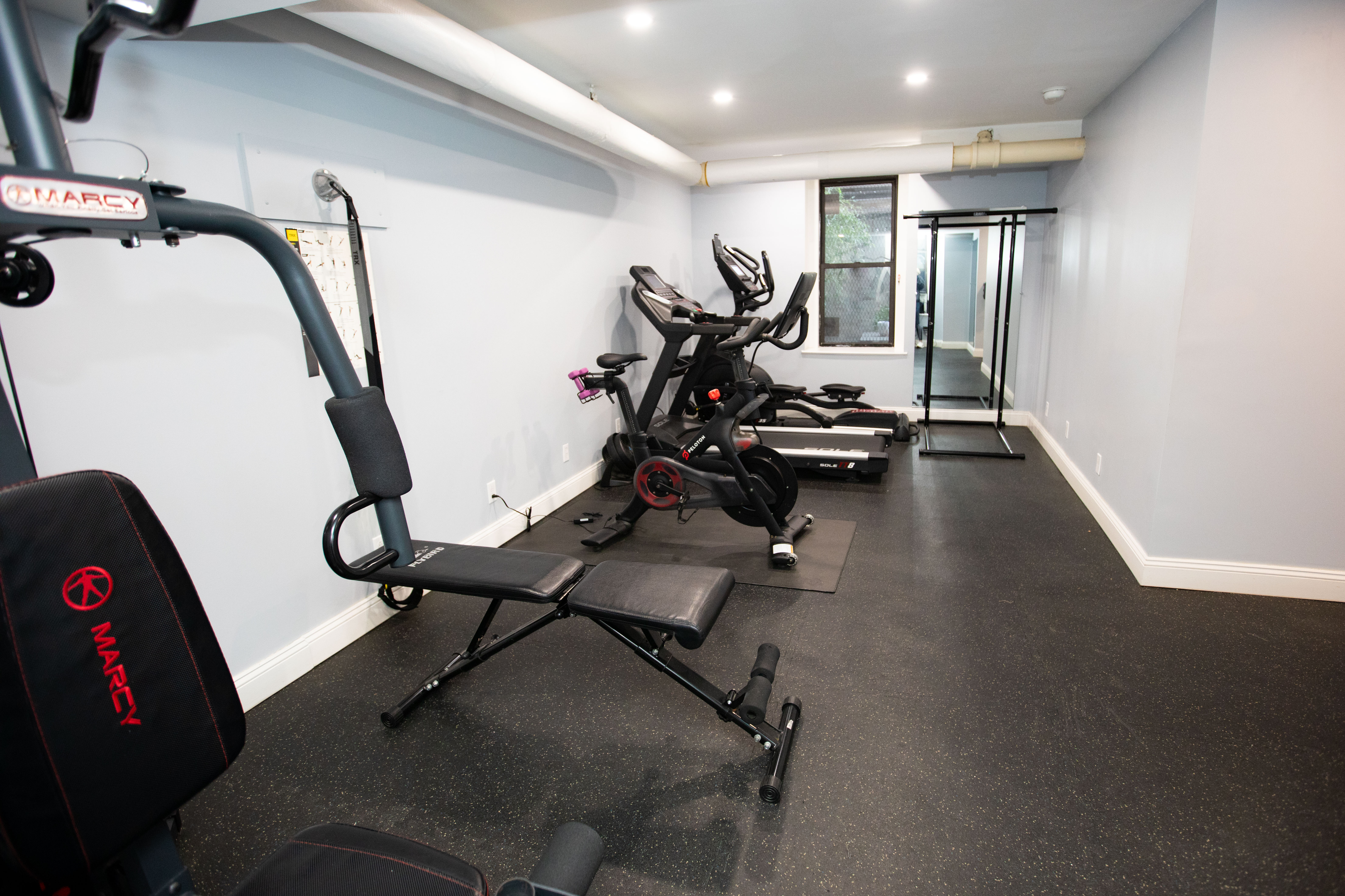 119 West 71st Street, Unit 9B Manhattan, NY 10023 - Photo 15 of 18 a view of a room with gym equipment