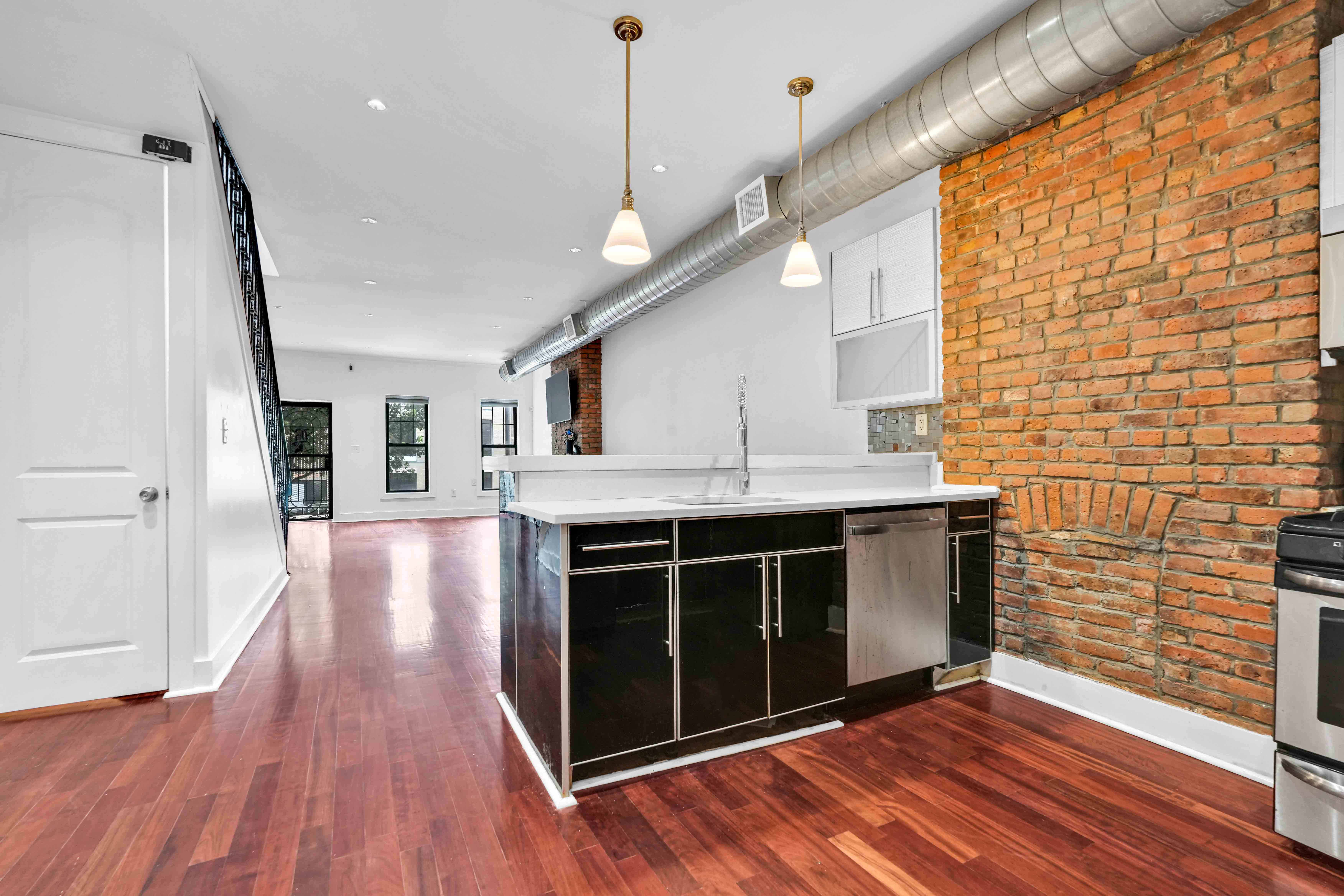 17 A Suydam Place, Unit 2 Brooklyn, NY 11233 - Photo 9 of 28 a view of an empty room with wooden floor and a window