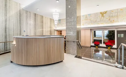 a view of a living room and entry way