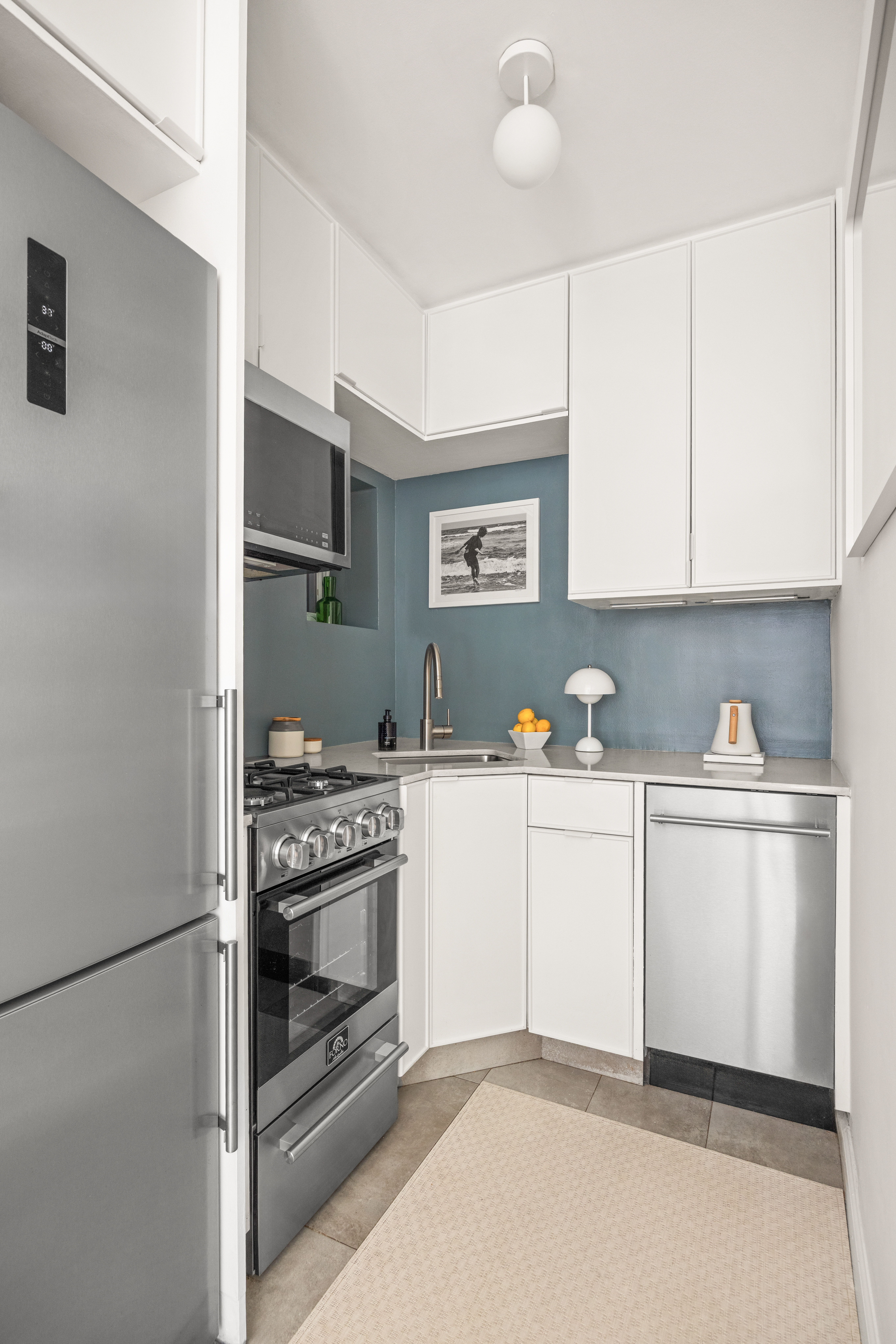 135 Amity Street, Unit 1A Brooklyn, NY 11201 - Photo 4 of 9 a kitchen with cabinets appliances and a sink