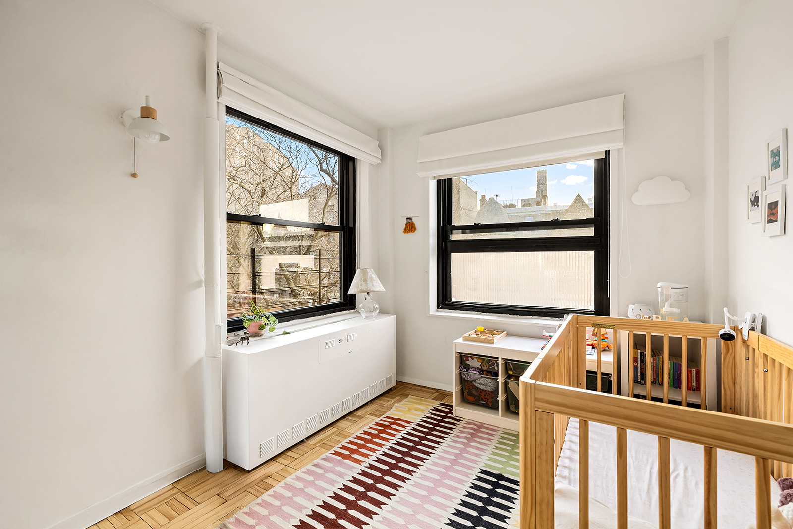 185 Clinton Avenue, Unit 4H Brooklyn, NY 11205 - Photo 5 of 9 a living room with furniture and a window