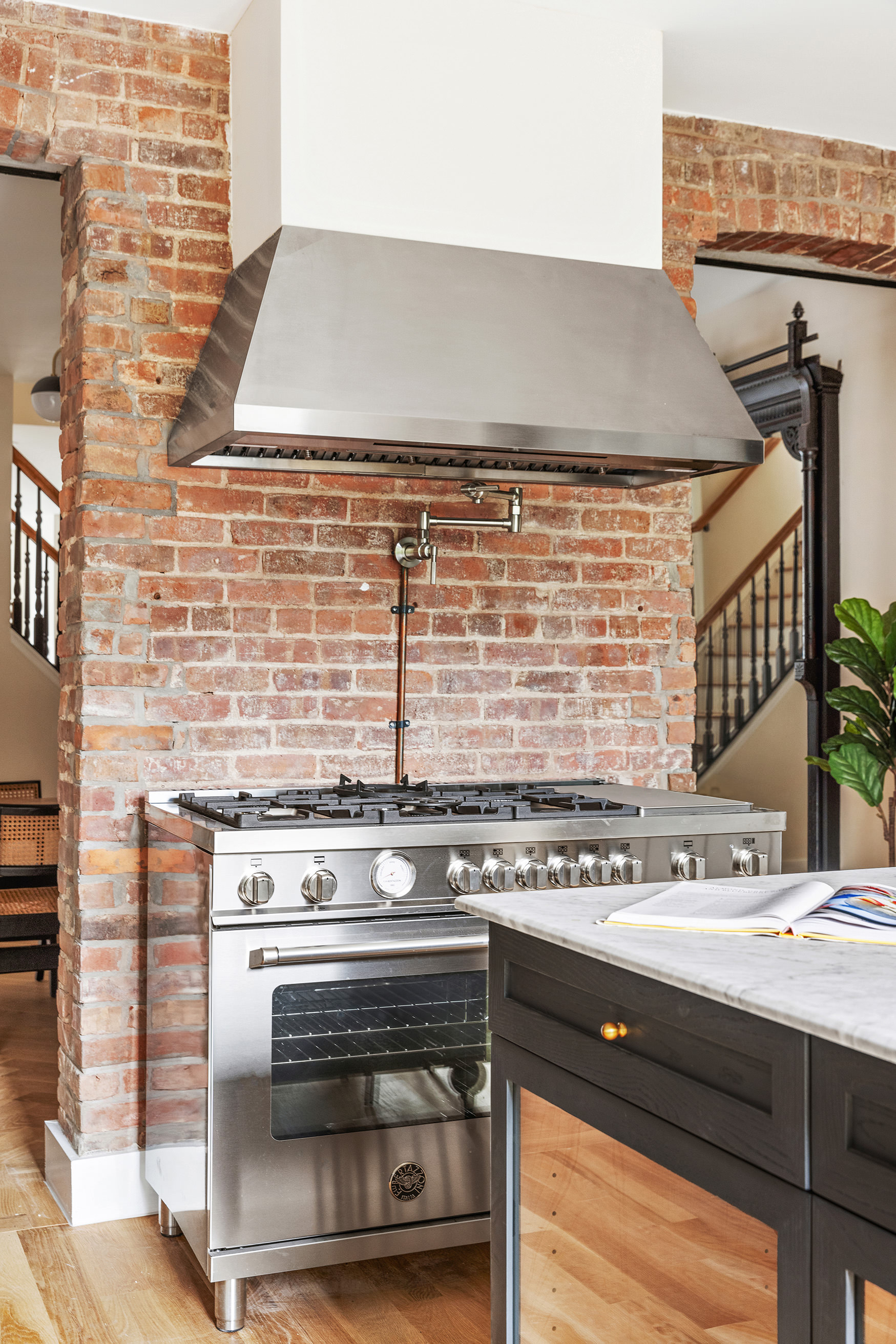 167 Putnam Avenue, Unit MF Brooklyn, NY 11216 - Photo 7 of 19 a stove top oven sitting inside of a kitchen