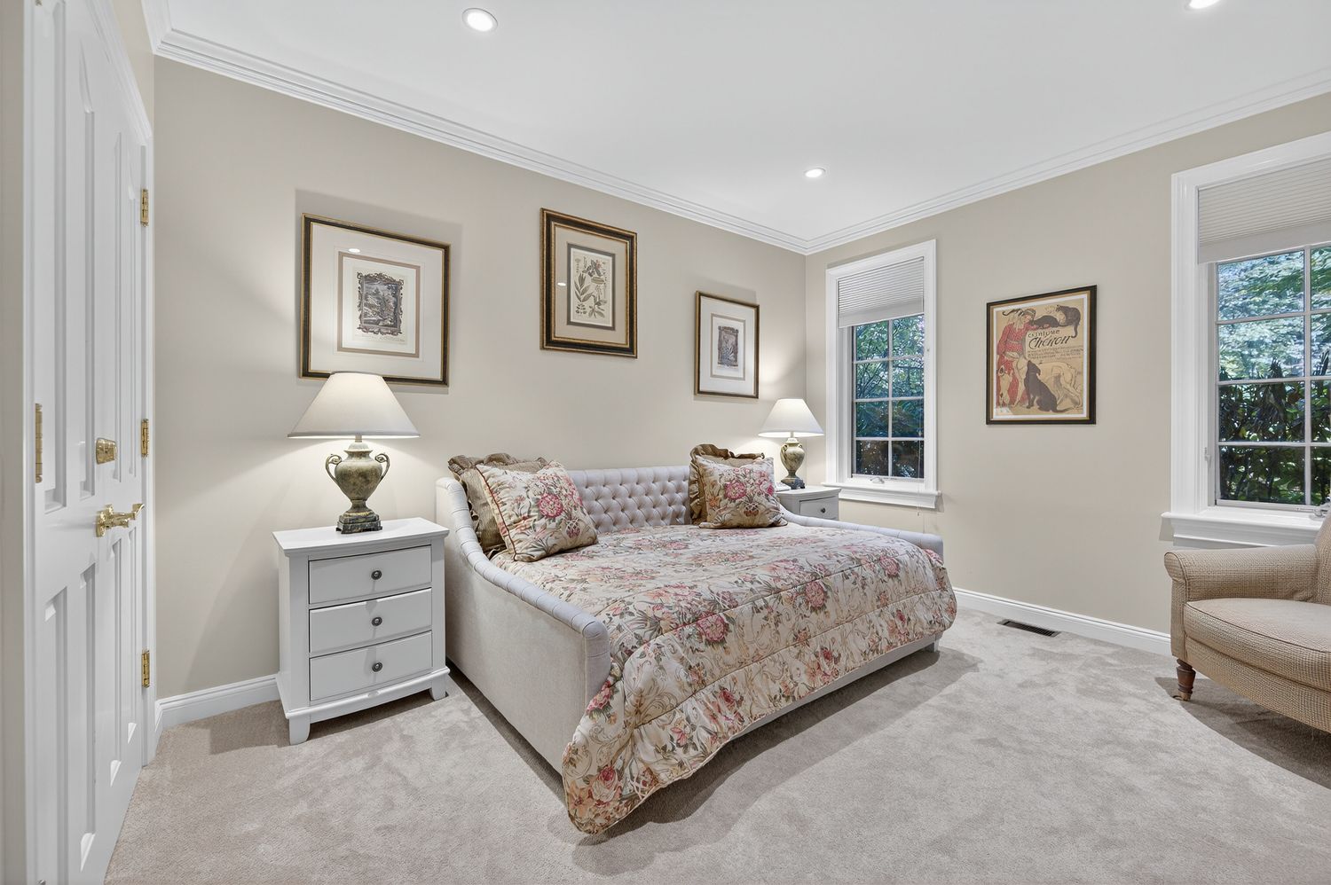 a bedroom with a bed and a couch