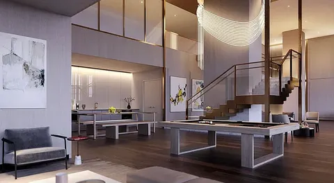 a view of kitchen with a sink and a refrigerator