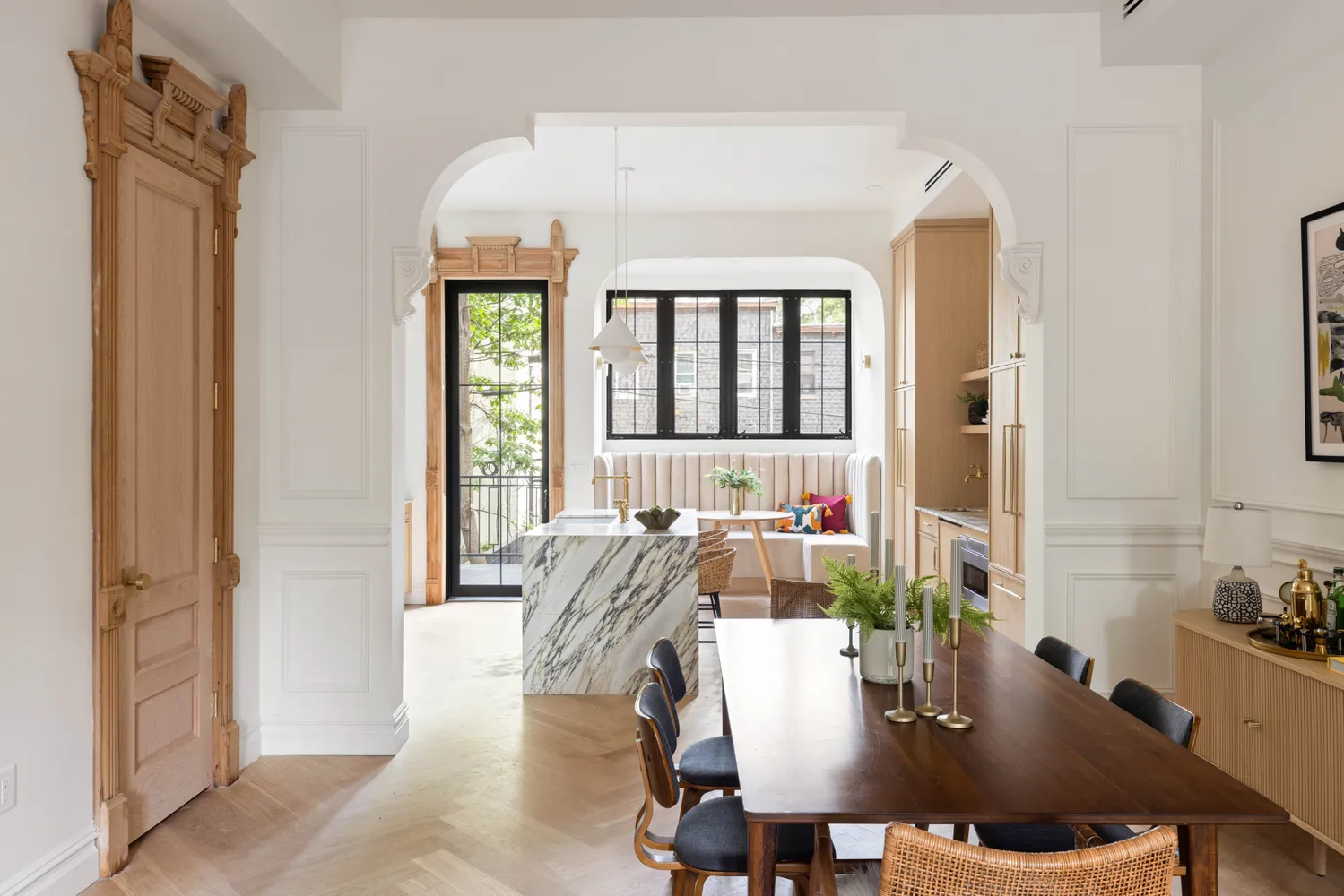 a view of a dining room with furniture and window