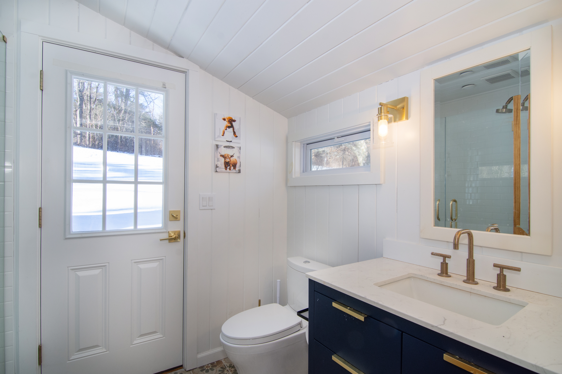 41 Harris Road Katonah, NY 10536 - Photo 33 of 48 a bathroom with a granite countertop sink toilet a large mirror and a window