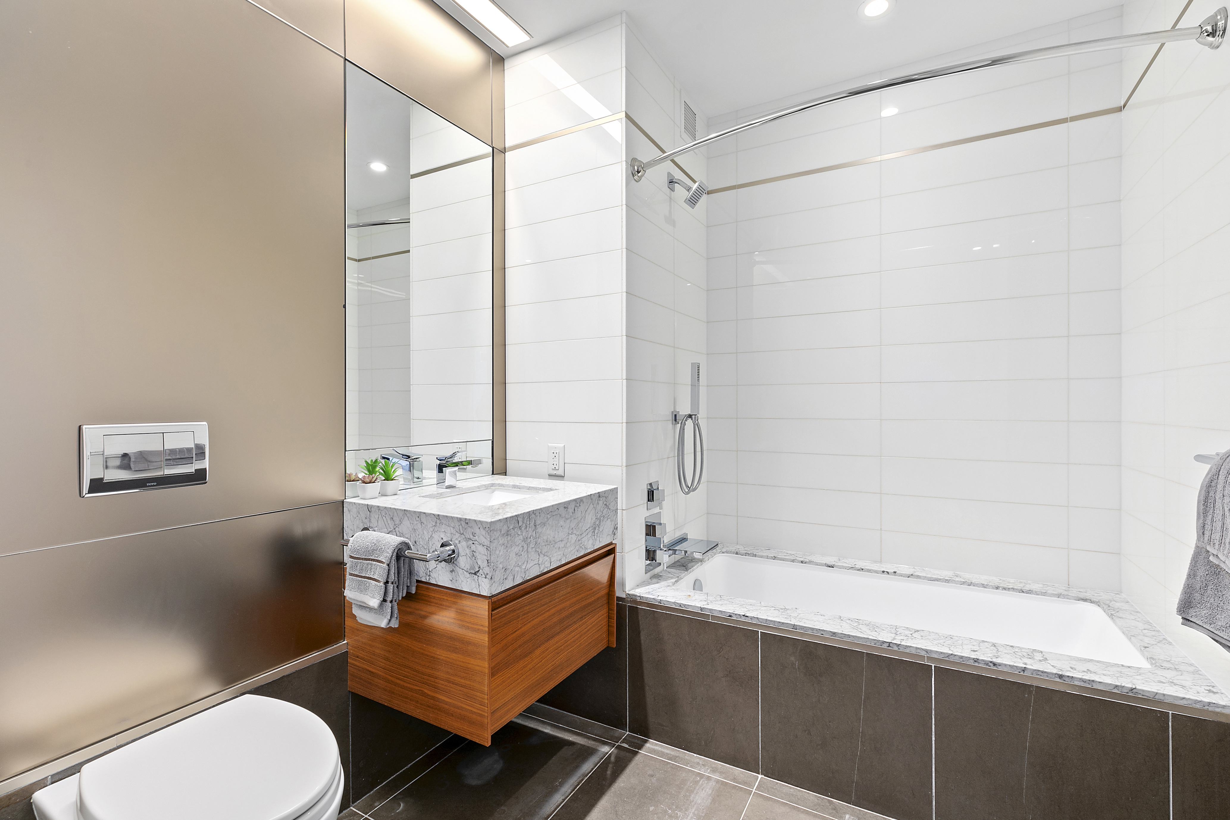 400 Park Avenue South, Unit 23G Manhattan, NY 10016 - Photo 6 of 7 a room with blue walls and window