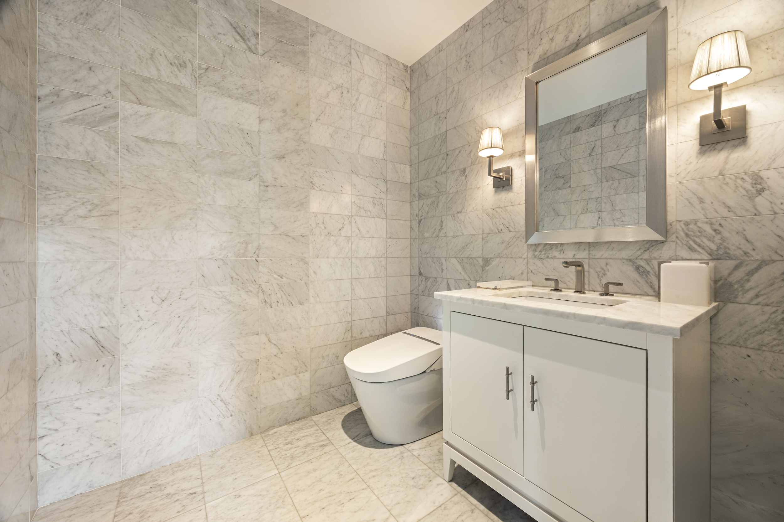 146 Waverly Place Manhattan, NY 10014 - Photo 31 of 41 a bathroom with a sink toilet and a mirror