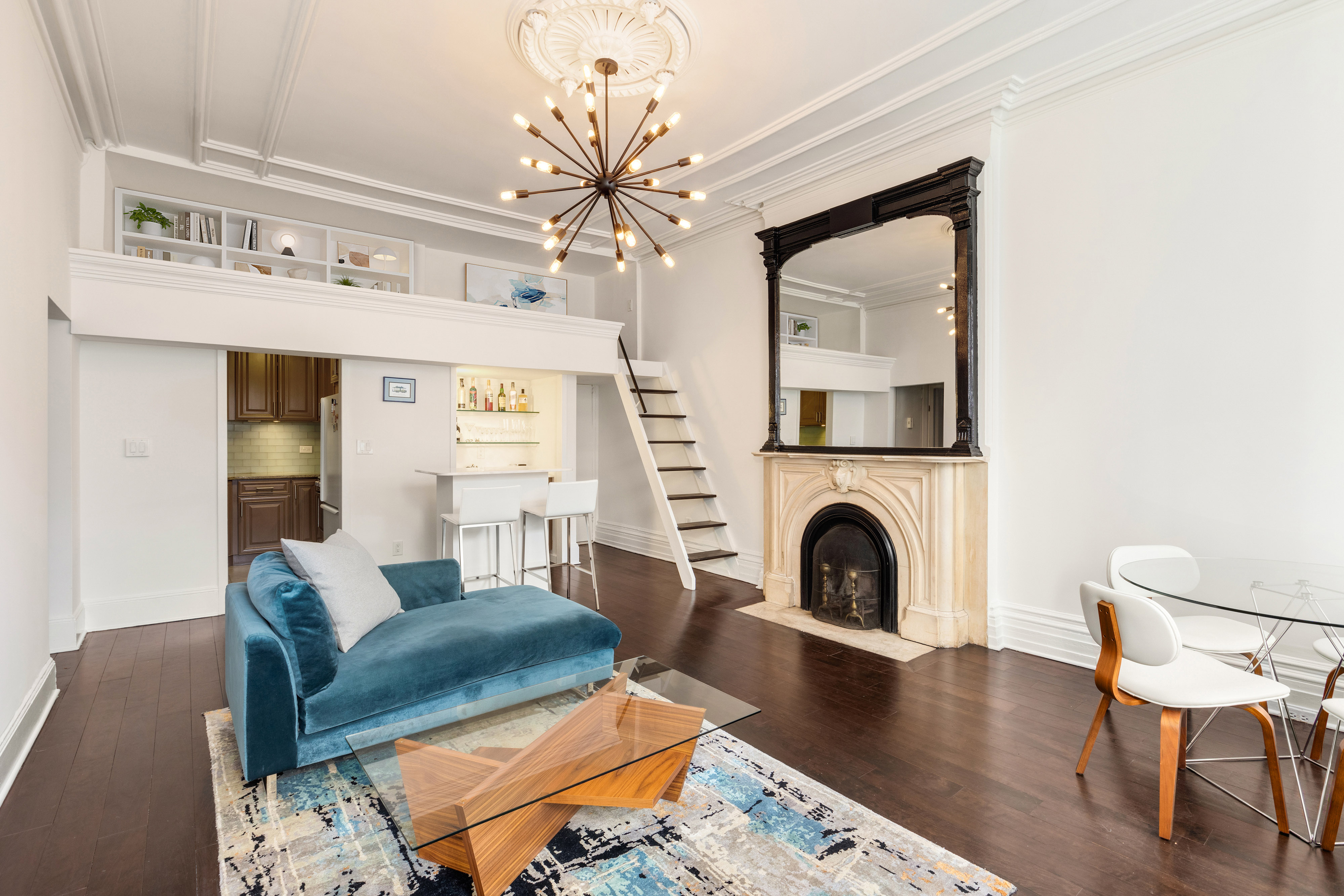 111 East 36th Street, Unit 4A Manhattan, NY 10016 - Photo 2 of 19 a living room with furniture and a fireplace
