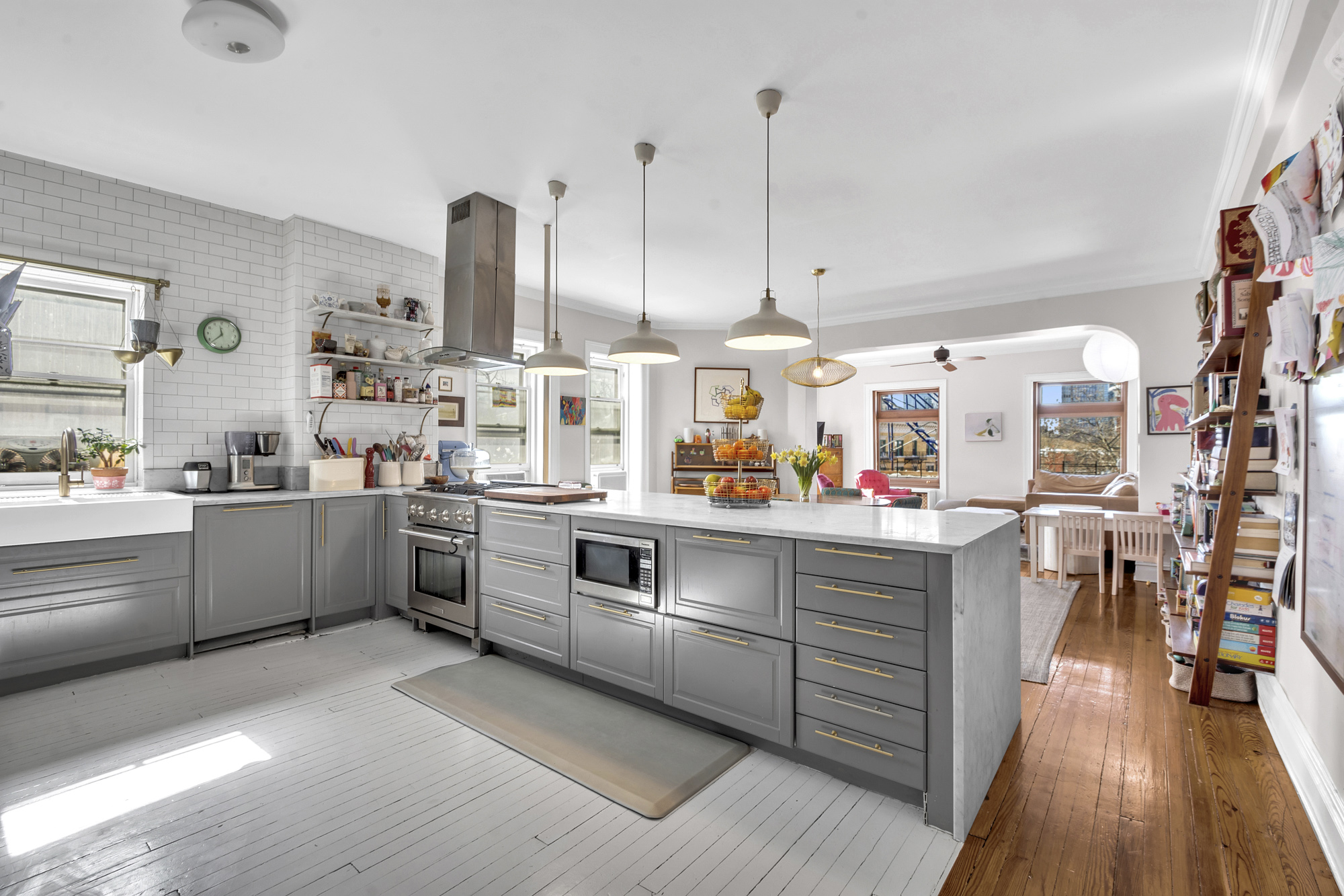 275 Clinton Avenue, Unit 4-1 Brooklyn, NY 11205 - Photo 9 of 20 a kitchen with stainless steel appliances and white cabinets