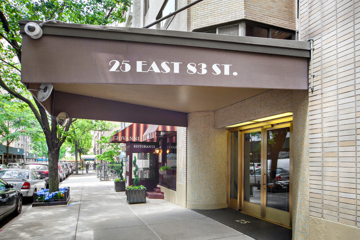 25 East 83rd Street, Unit 10D Manhattan, NY 10028 - Photo 16 of 17 a front view of a building with street