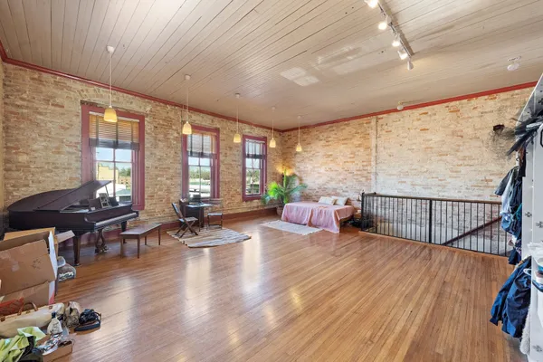 a bed room with a bed and a couch