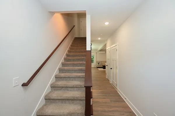 a view of a hallway with staircase