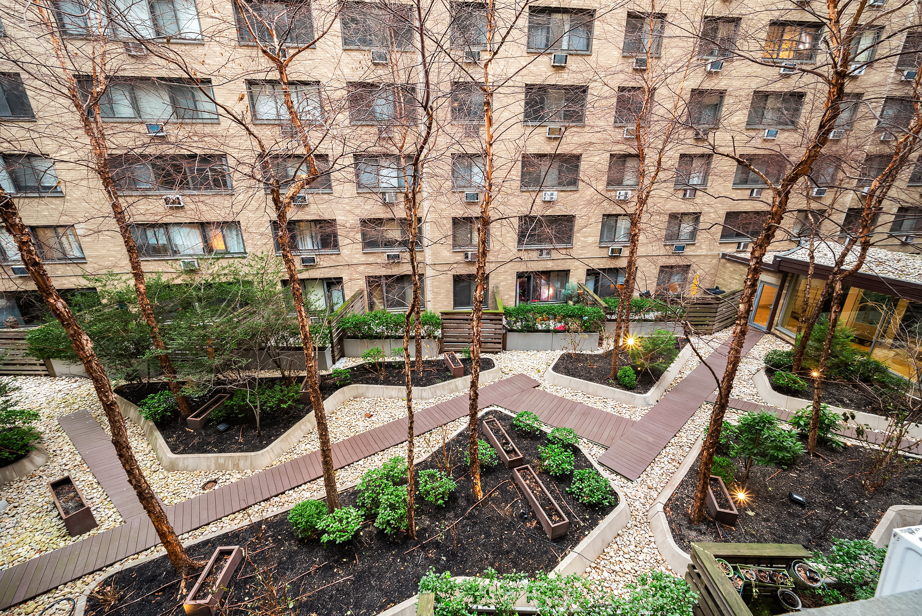 16 West 16th Street, Unit 3FS Manhattan, NY 10011 - Photo 6 of 12 a view of a building with garden and sitting area