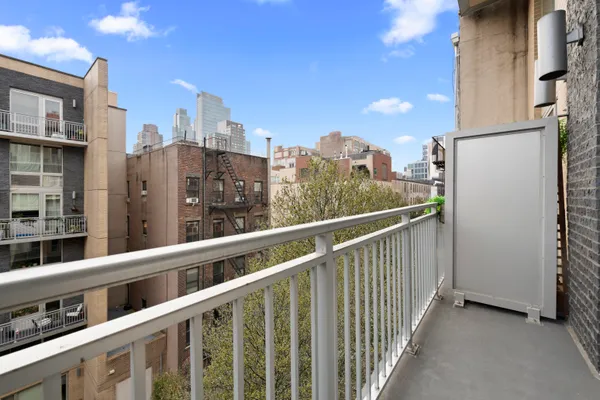 a view of a building from a balcony