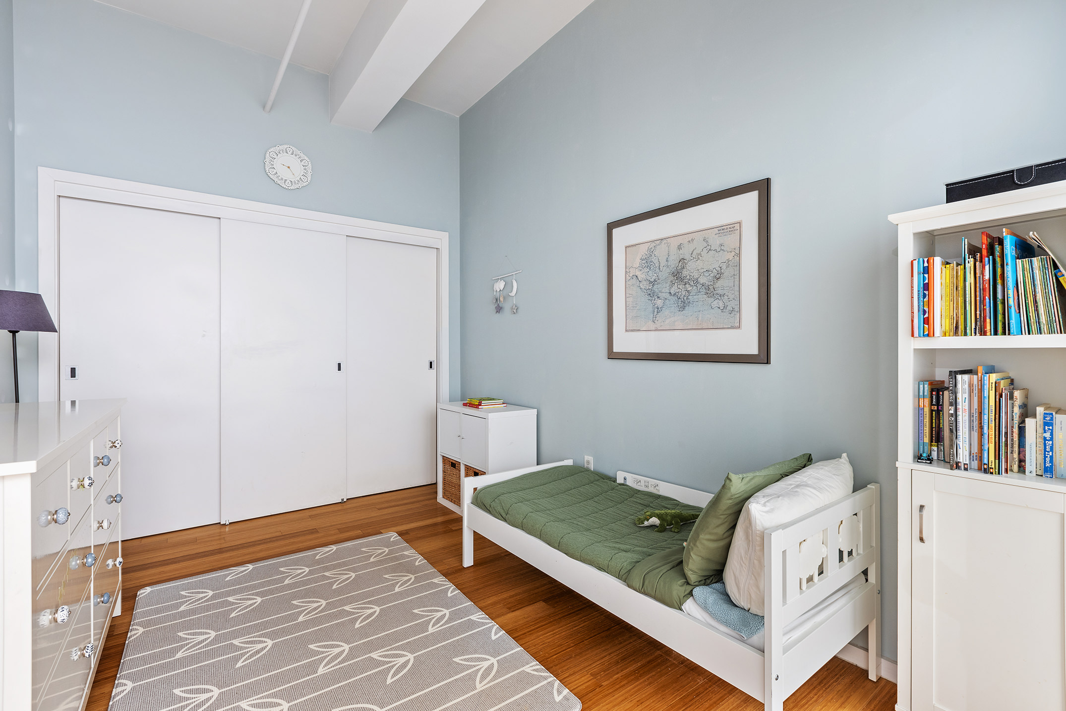 365 Bridge Street, Unit 8I Brooklyn, NY 11201 - Photo 7 of 10 a living room with hard wood floors and a couch