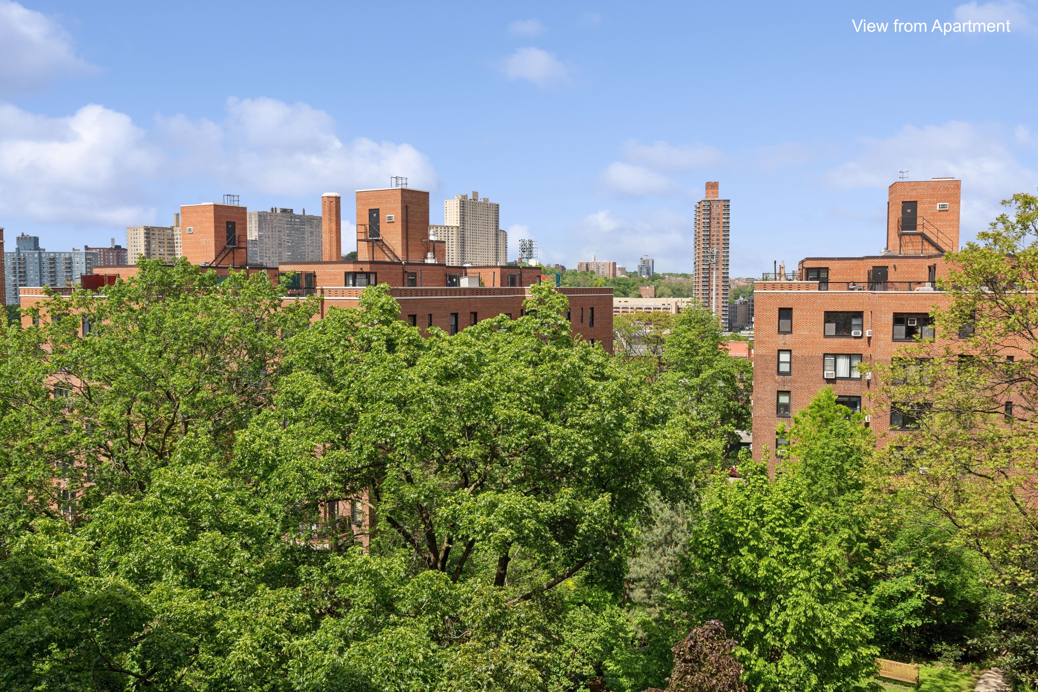 55 Park Terrace East, Unit B74 Manhattan, NY 10034 - Photo 10 of 26 a view of a city with tall buildings