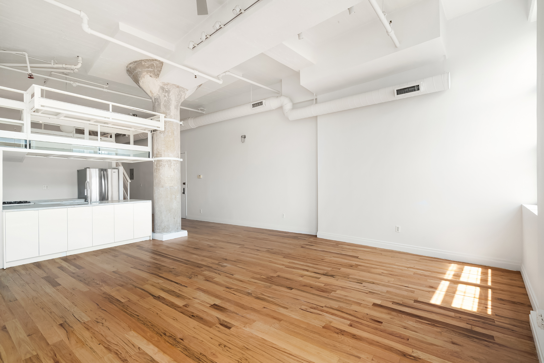 689 Myrtle Avenue, Unit 4E Brooklyn, NY 11205 - Photo 6 of 21 a view of empty room with wooden floor