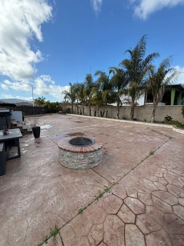 a view of a backyard of a house