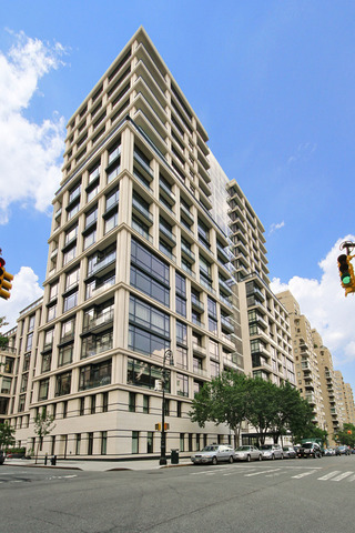 170 East End Avenue, Unit 16B Manhattan, NY 10128 - Photo 20 of 21 a view of a building with a street