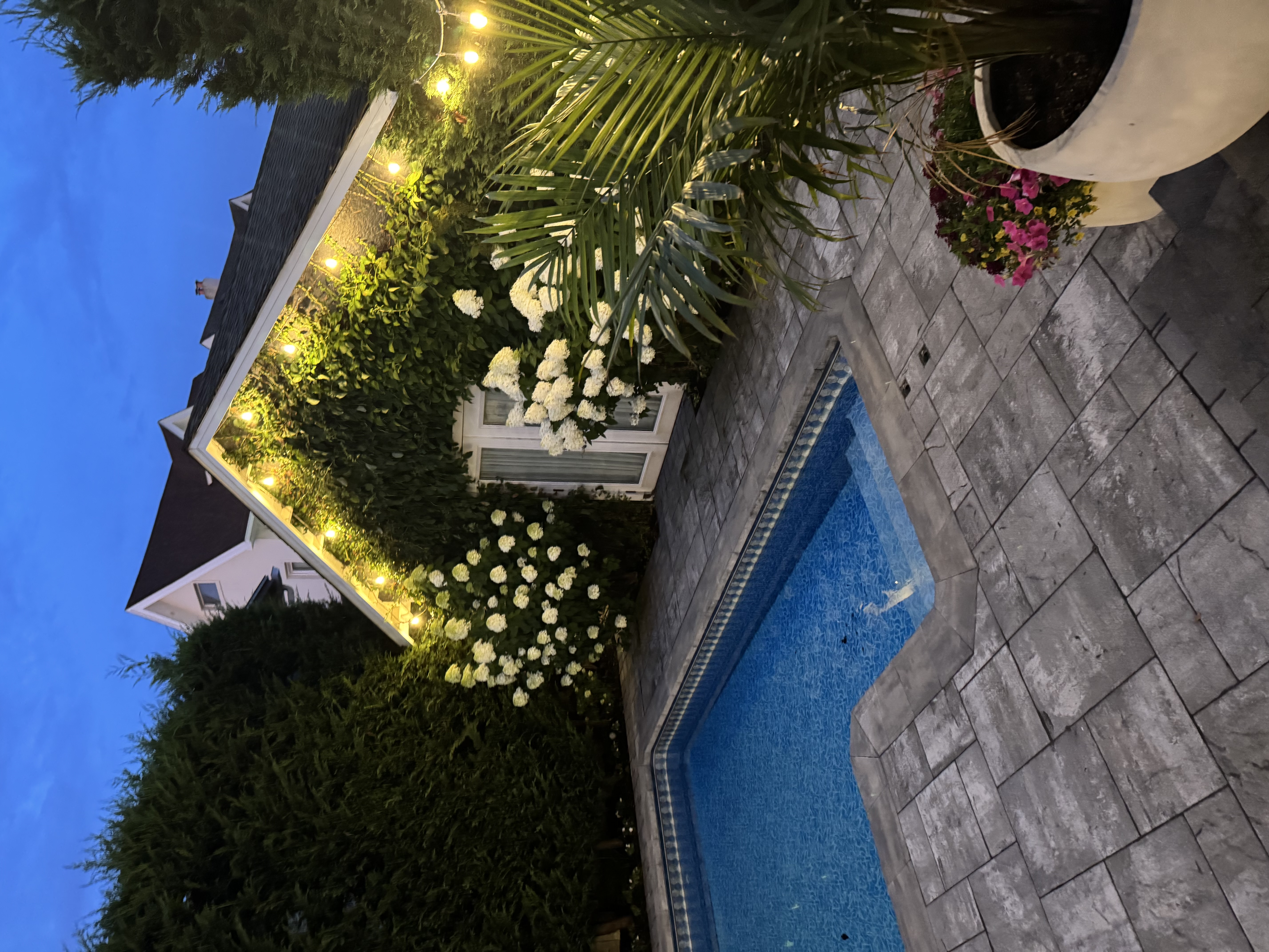 334 Beach 146th Street Queens, NY 11694 - Photo 21 of 21 a view of a chairs and table in the backyard