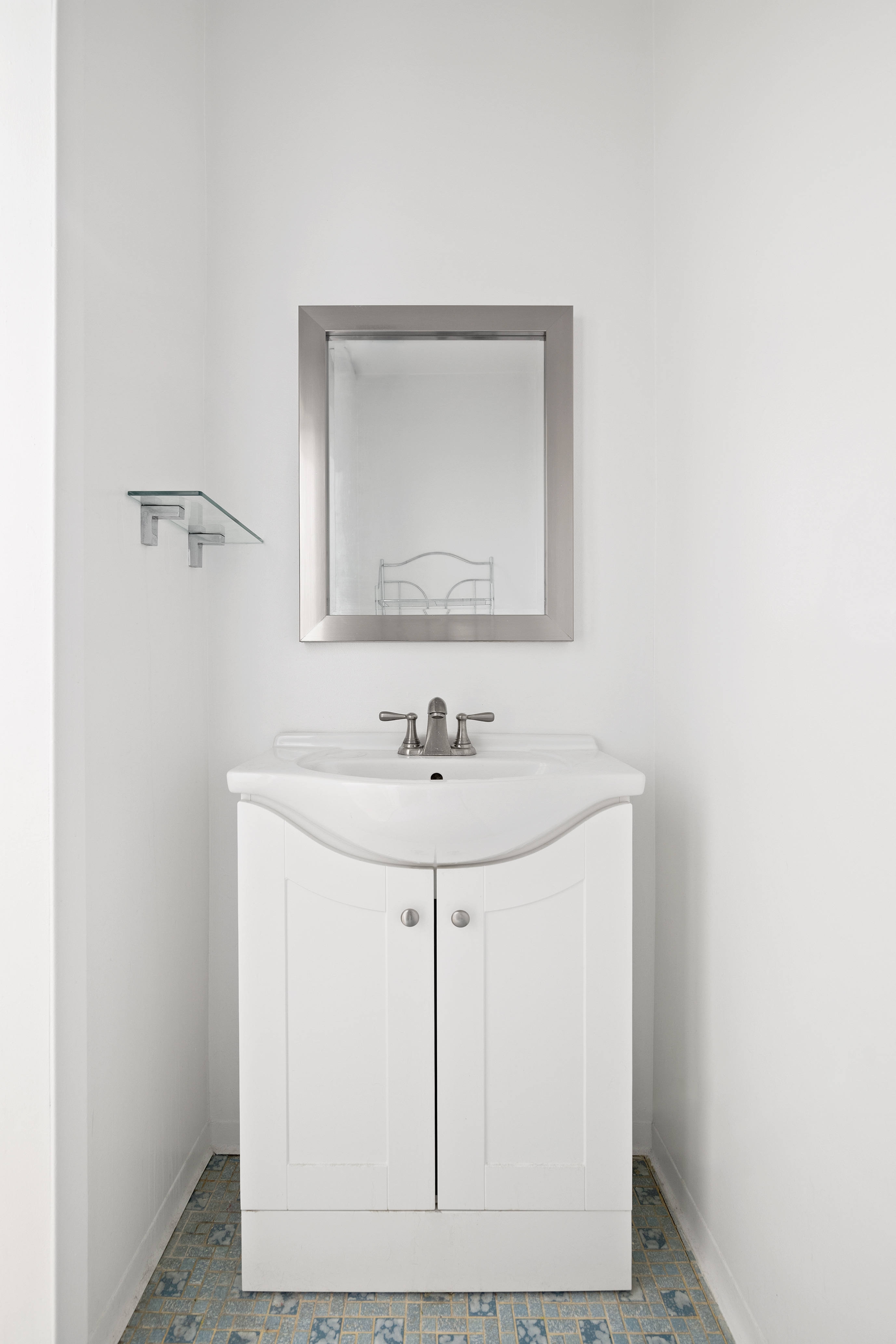361 3rd Avenue, Unit 1 Manhattan, NY 10016 - Photo 6 of 7 a bathroom with a sink and a mirror