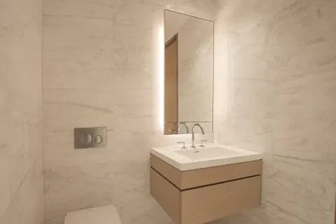 a white sink sitting next to a white sink
