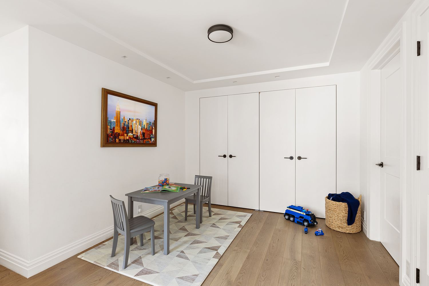 303 Greenwich Street, Unit 8DE Manhattan, NY 10013 - Photo 15 of 20 a view of a workspace with furniture and a table