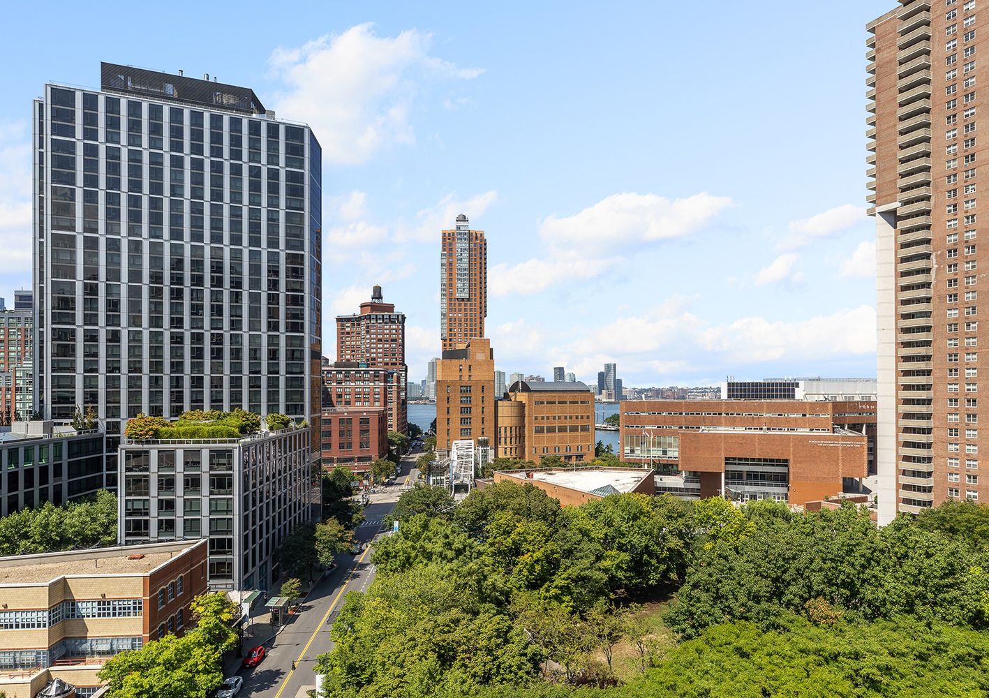 303 Greenwich Street, Unit 8DE Manhattan, NY 10013 - Photo 5 of 20 a view of a city with tall buildings