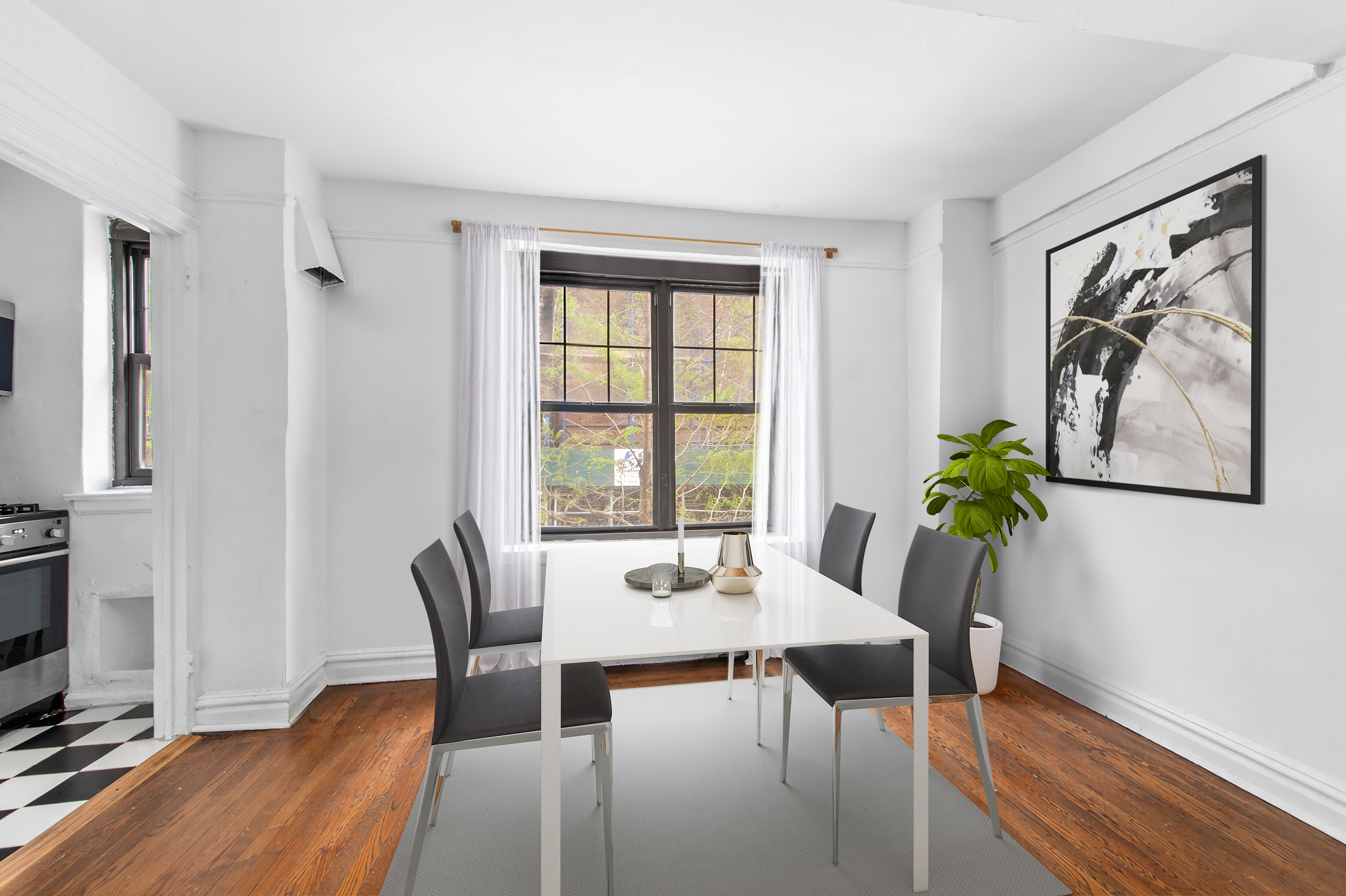 200 East 16th Street, Unit 2A Manhattan, NY 10003 - Photo 2 of 11 a view of a dining room with furniture window and wooden floor