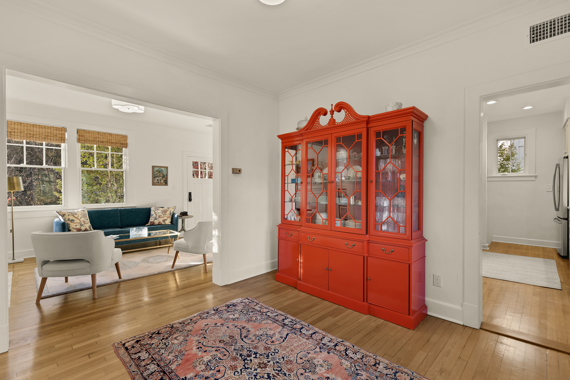 6815 Delaware Street Chevy Chase, MD 20815 - Photo 5 of 34 a living room with furniture a rug and a window