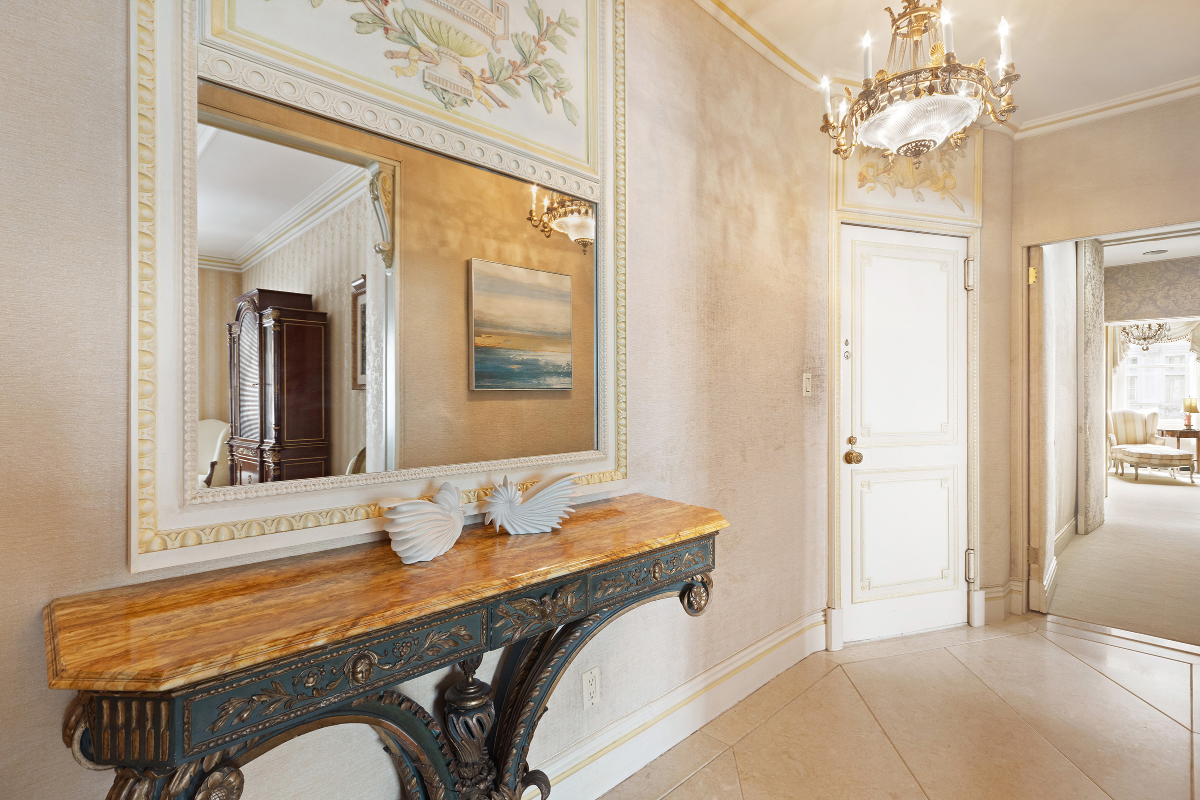 31 East 72nd Street, Unit 4B Manhattan, NY 10021 - Photo 12 of 14 a bathroom with a tub and a mirror