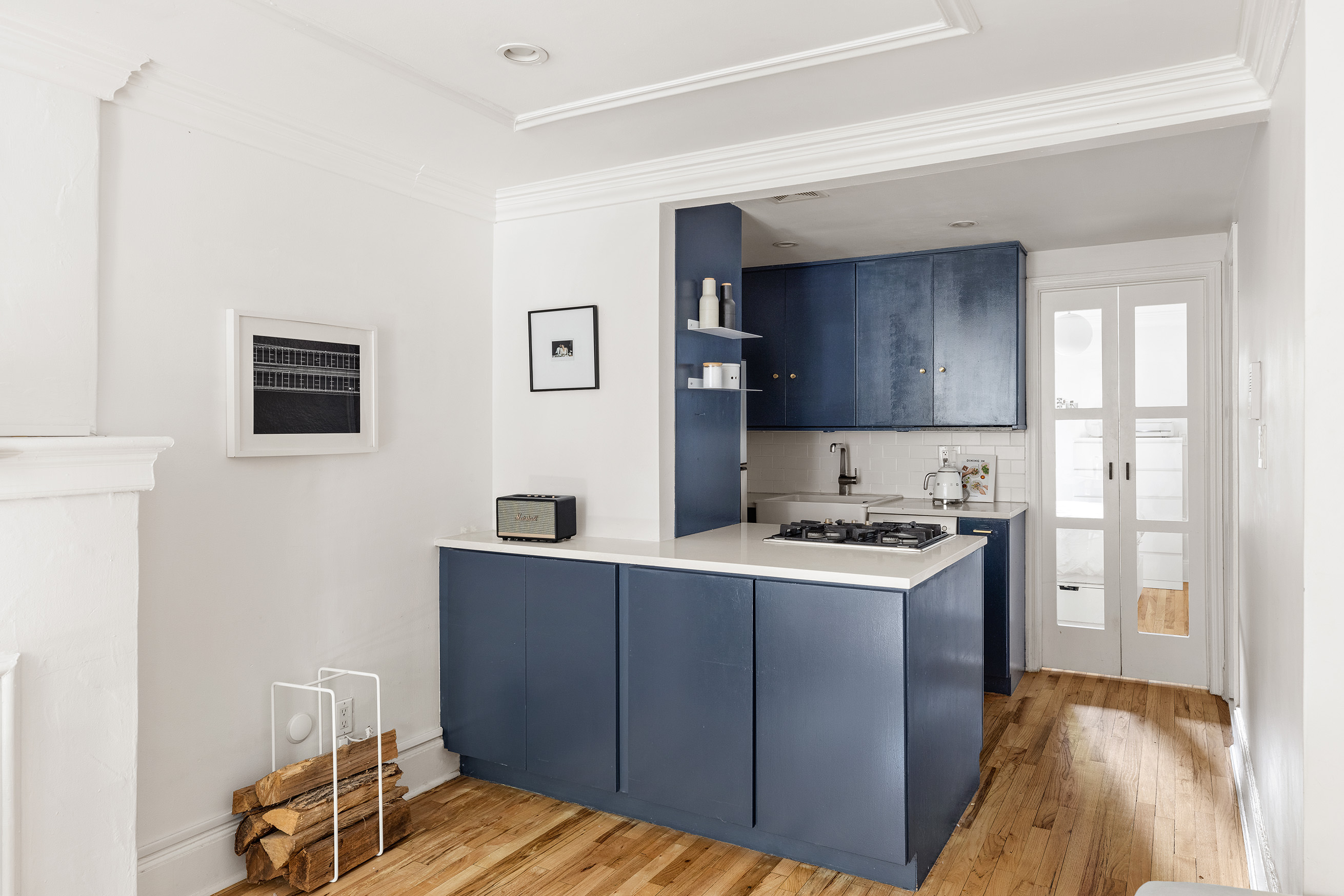 659 Degraw Street, Unit 1 Brooklyn, NY 11217 - Photo 4 of 10 a kitchen with a stove and a refrigerator