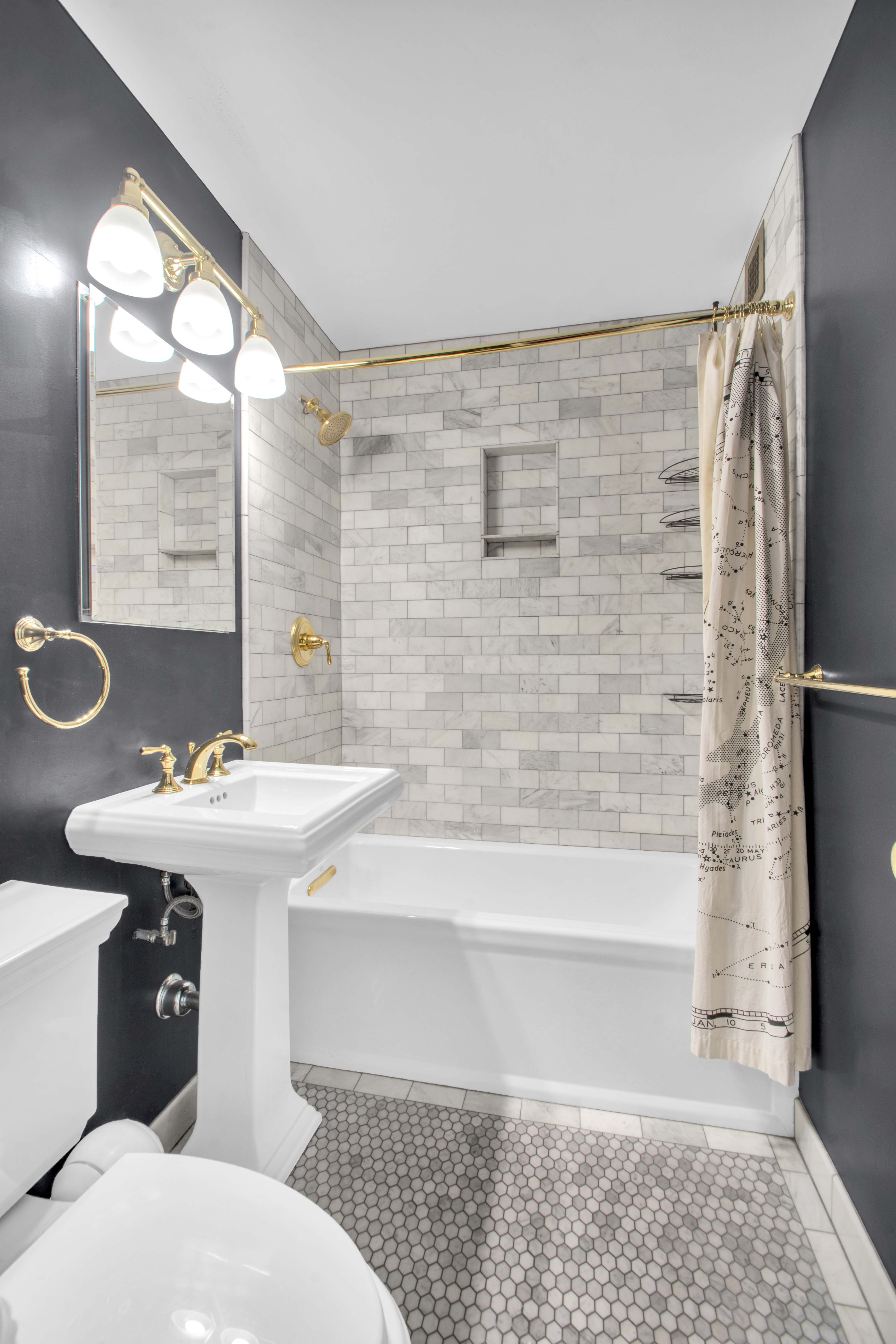 75 Henry Street, Unit 29J Brooklyn, NY 11201 - Photo 8 of 16 a bathroom with a sink a toilet and shower