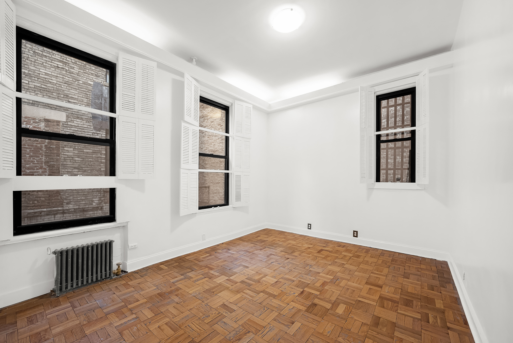 862 West End Avenue, Unit GARDEN Manhattan, NY 10025 - Photo 6 of 13 a view of an empty room with a window