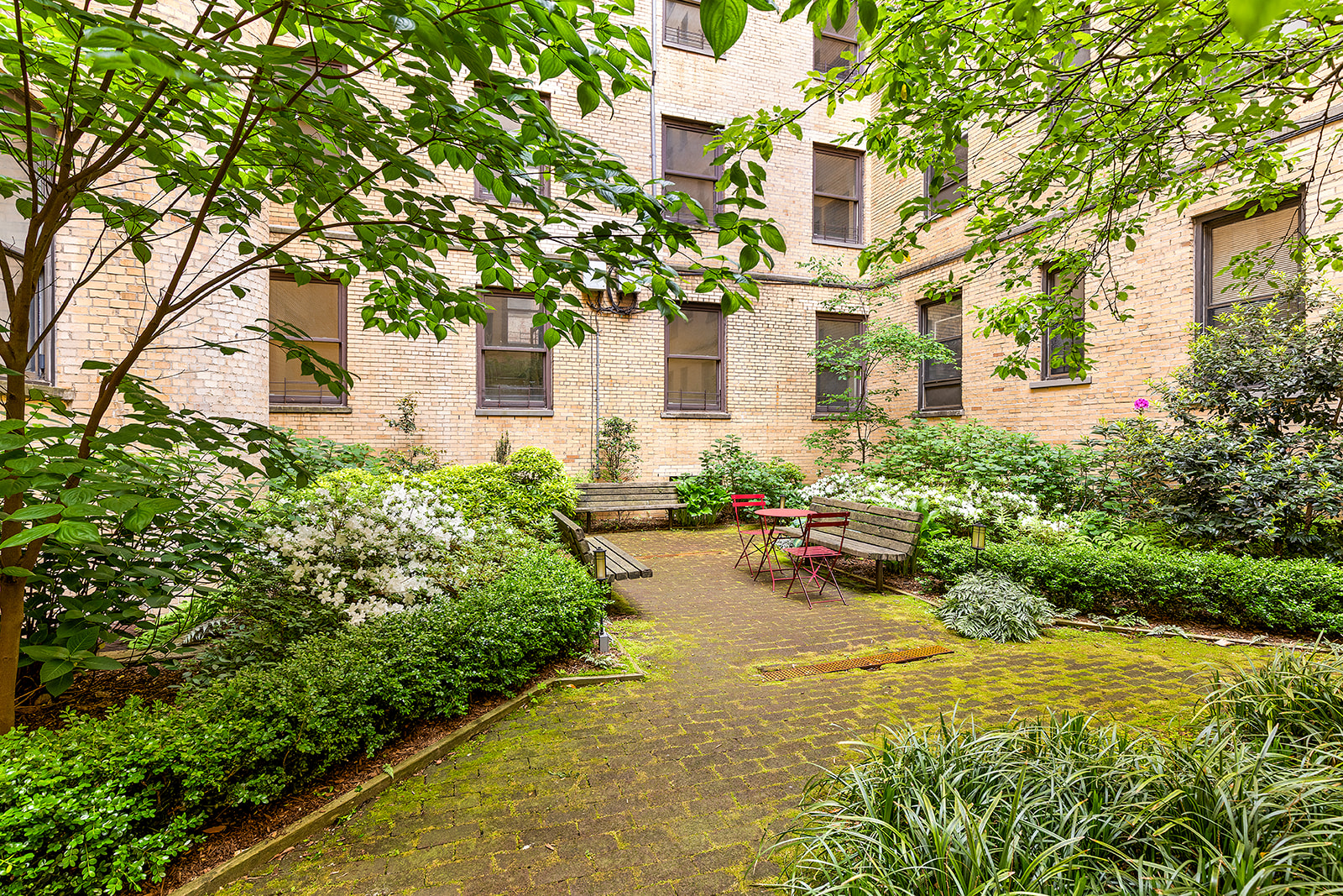 295 St Johns Place, Unit 1C Brooklyn, NY 11238 - Photo 12 of 17 a front view of a house with swimming pool and sitting area
