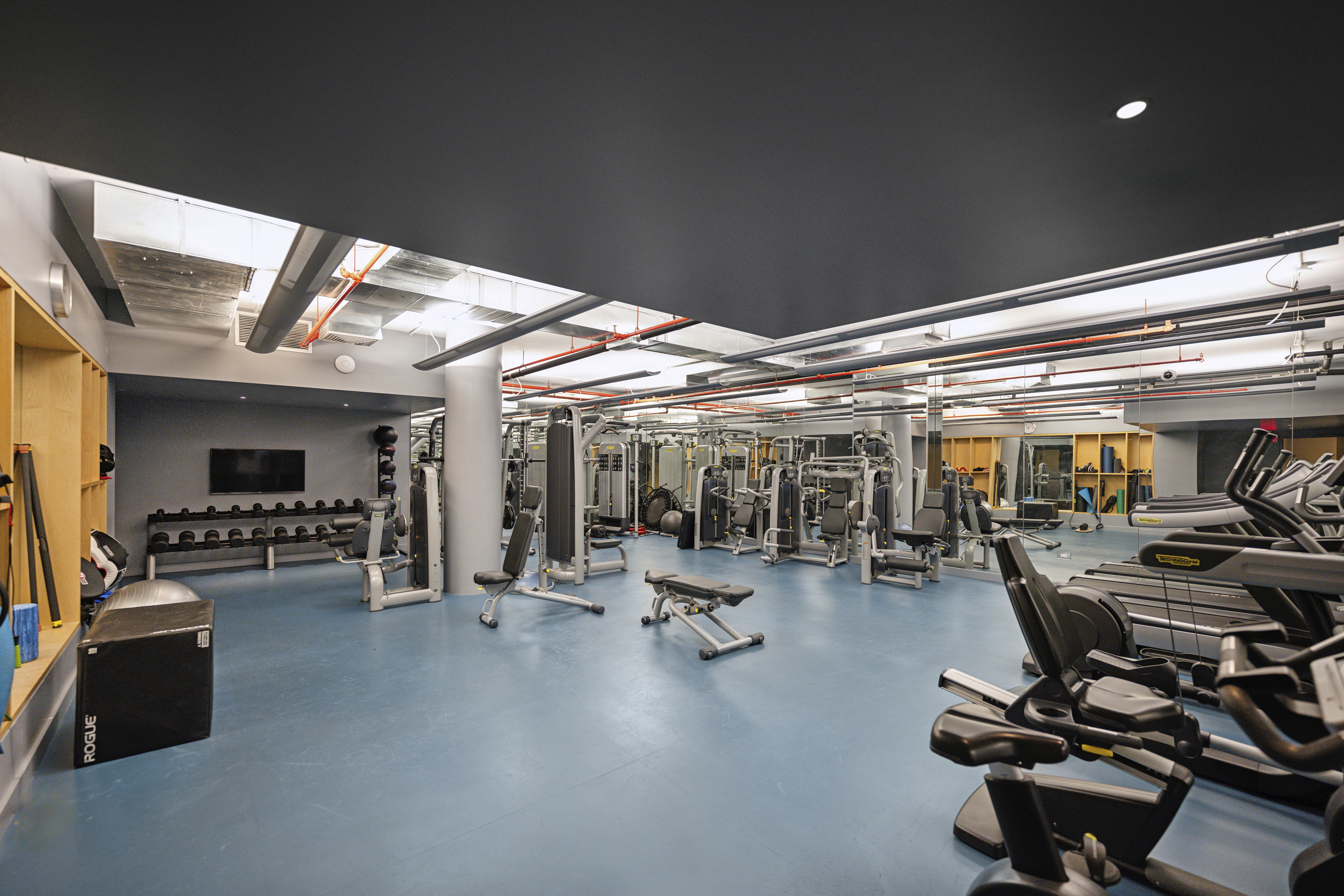 71 Reade Street, Unit 4D Manhattan, NY 10007 - Photo 13 of 15 a view of a room with gym equipment