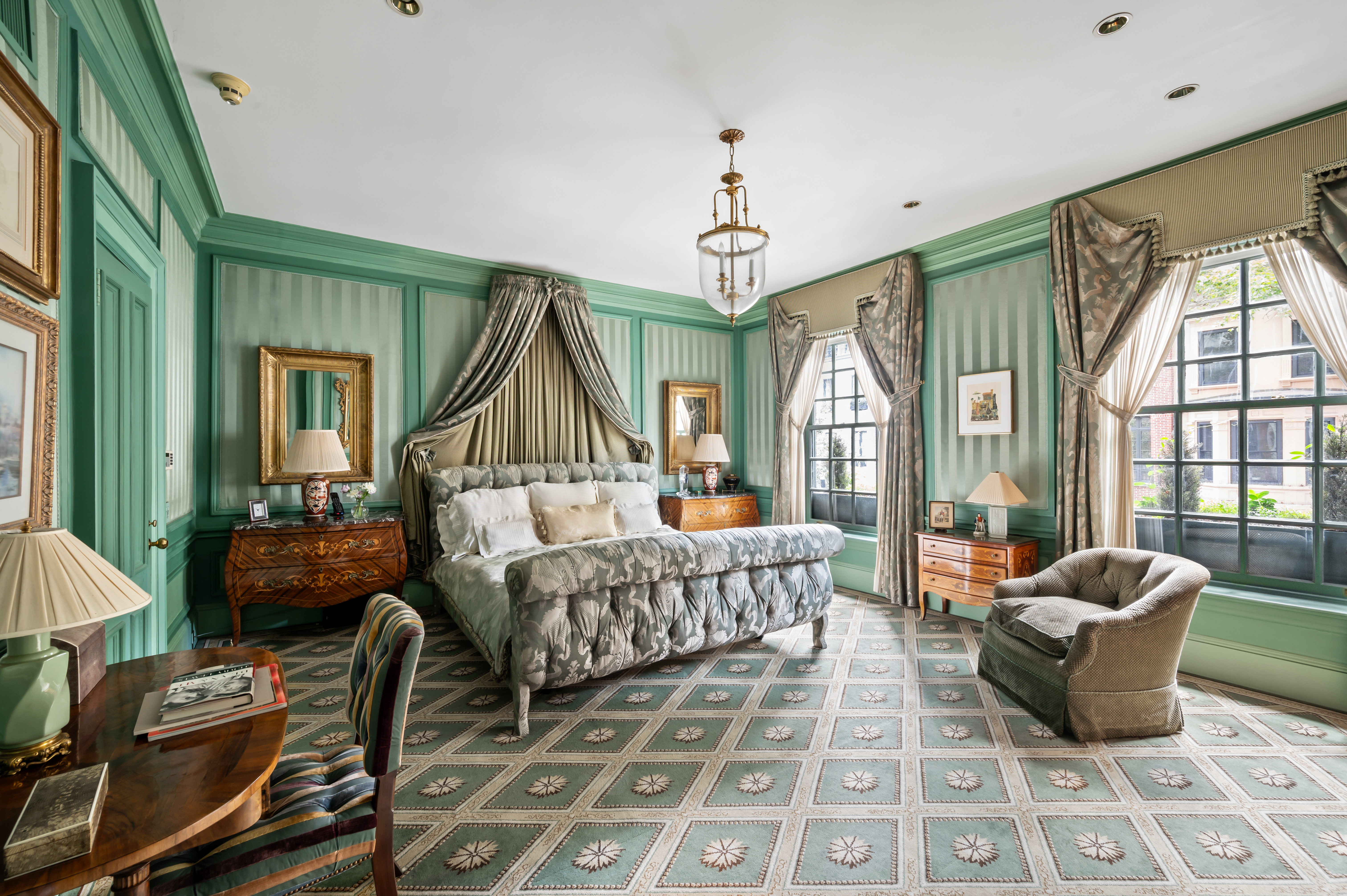 163 East 64th Street Manhattan, NY 10065 - Photo 23 of 34 a living room with furniture windows and a chandelier