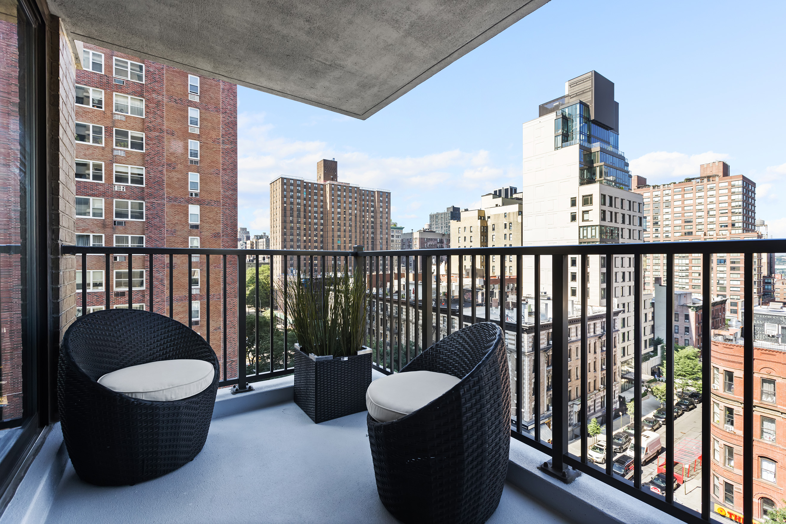 175 West 95th Street, Unit 10C Manhattan, NY 10025 - Photo 3 of 17 a view of roof deck with wooden fence and wooden floor