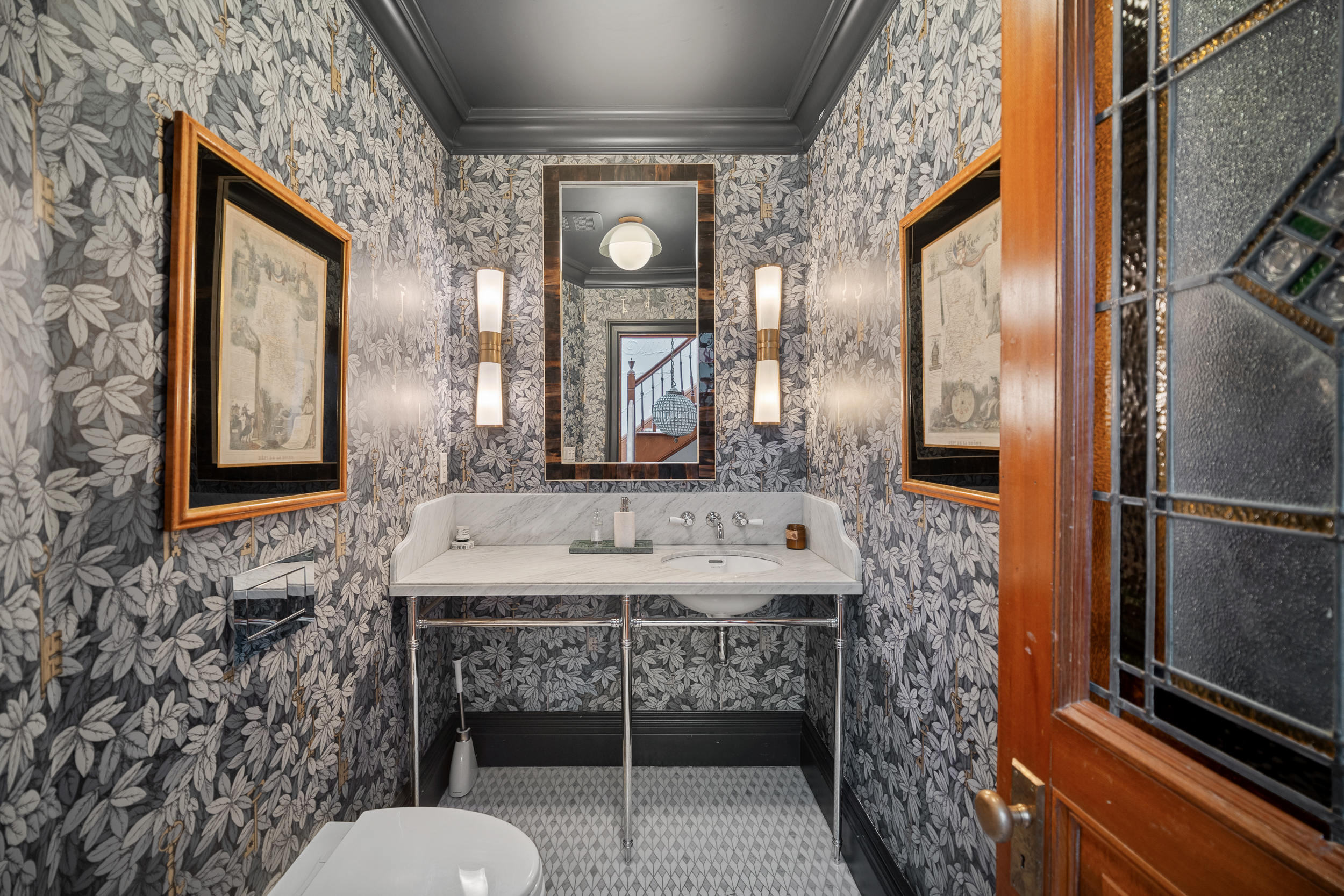 479 4th Street, Unit TRIPLEX Brooklyn, NY 11215 - Photo 9 of 17 a bathroom with a sink toilet and mirror