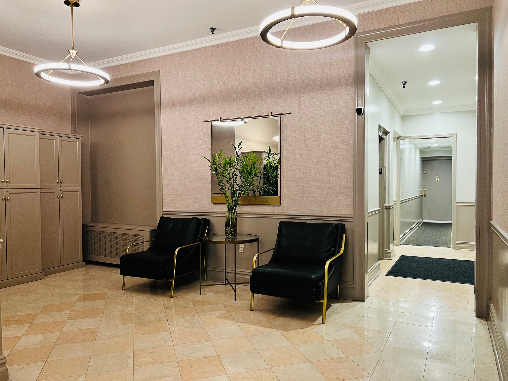 309 West 86th Street, Unit 11B Manhattan, NY 10024 - Photo 11 of 13 a living room with furniture and a chandelier