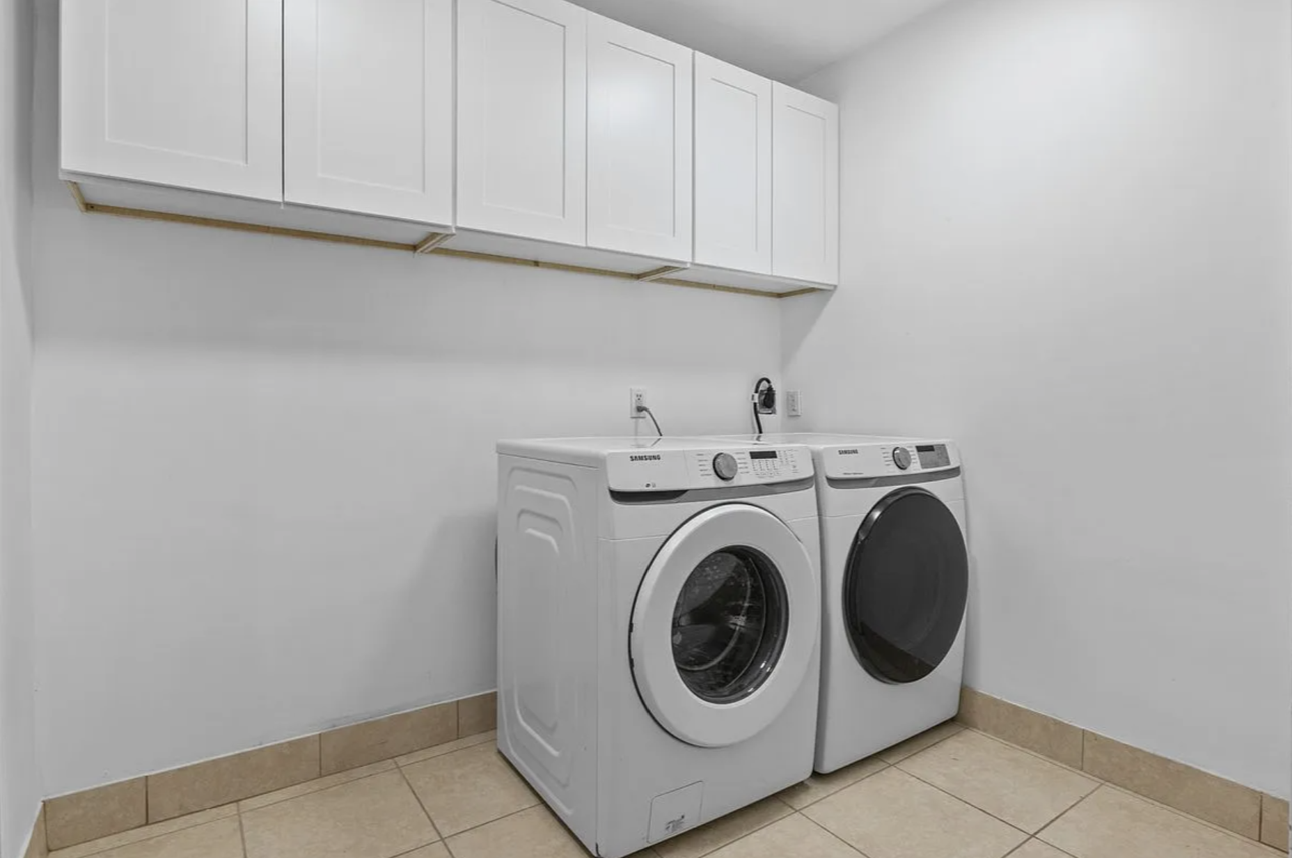 2882 West 15th Street, Unit 2B Brooklyn, NY 11224 - Photo 12 of 13 a utility room with dryer and washer
